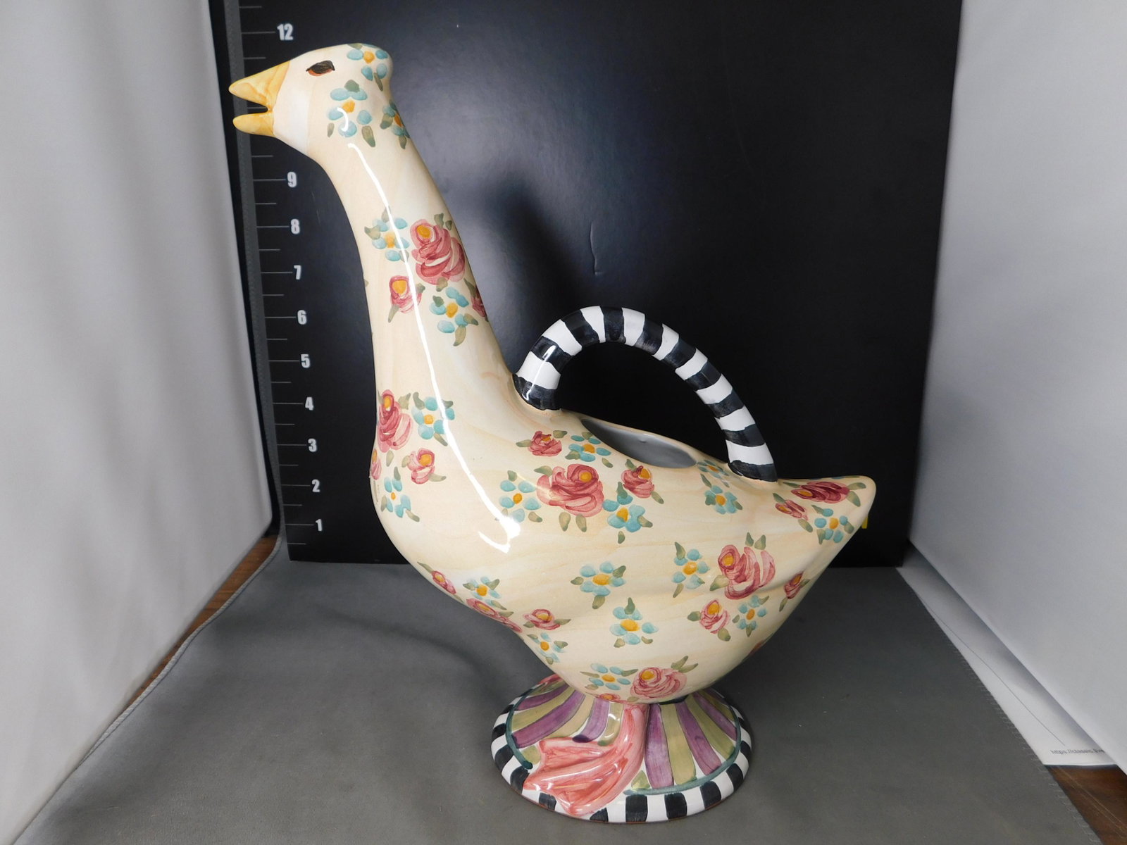 Mackenzie-Childs Duck Creamer: Mackenzie-Childs Duck Creamer. Measures 7.5' tall. You are bidding at a live sale, please read the terms and conditions. We are offering contact-less pick ups at our South Brunswick location by APPOIN