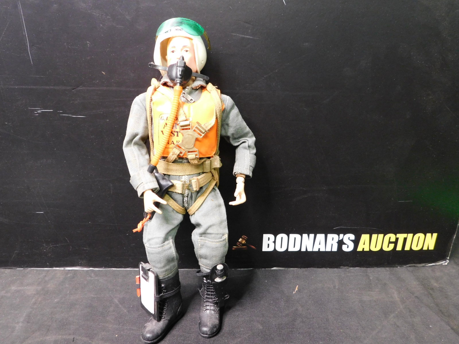 Vintage G.I. Joe 12" Figure: Vintage 12" G.I. Joe Figure. Marked 1964. Air Pilot. Comes with Accessories. You are bidding at a live sale, please read the terms and conditions. We are offering contact-less pick ups at our South Br