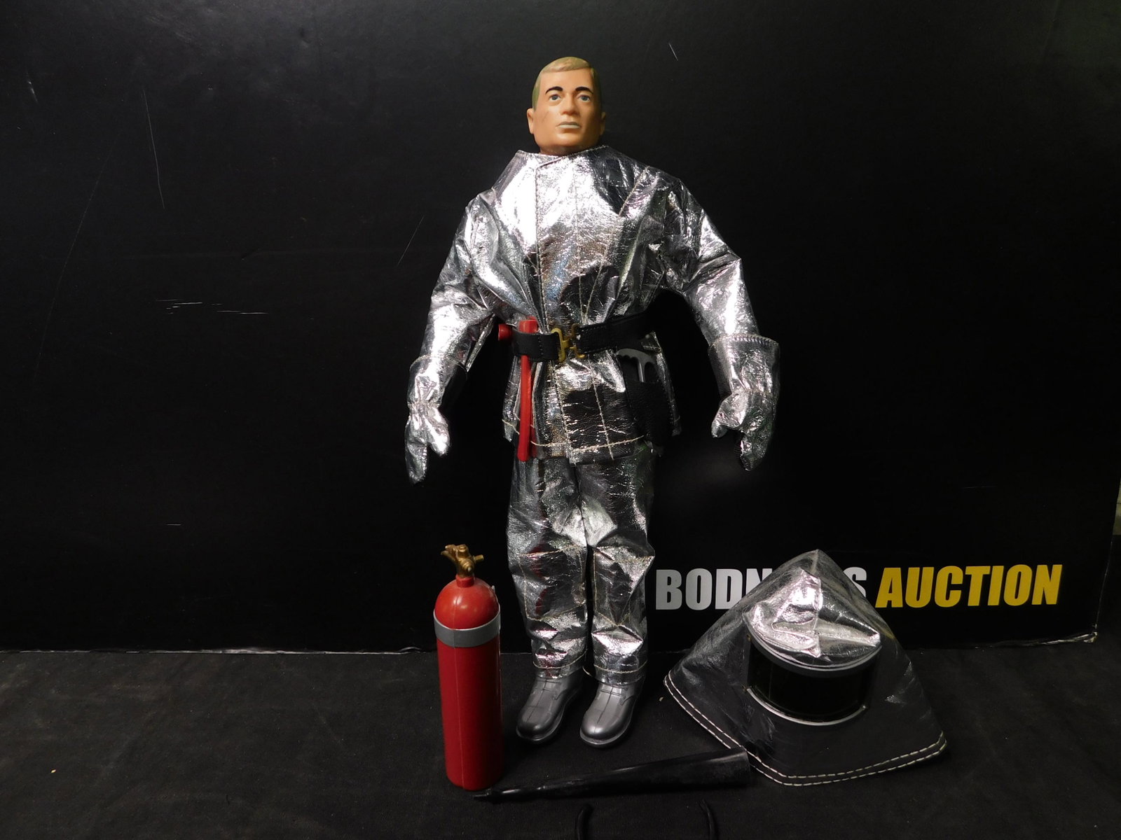Vintage G.I. Joe 12" Figure: Vintage 12" G.I. Joe Figure. Marked 1964. Comes with Accessories. Fire Fighter. You are bidding at a live sale, please read the terms and conditions. We are offering contact-less pick ups at our South