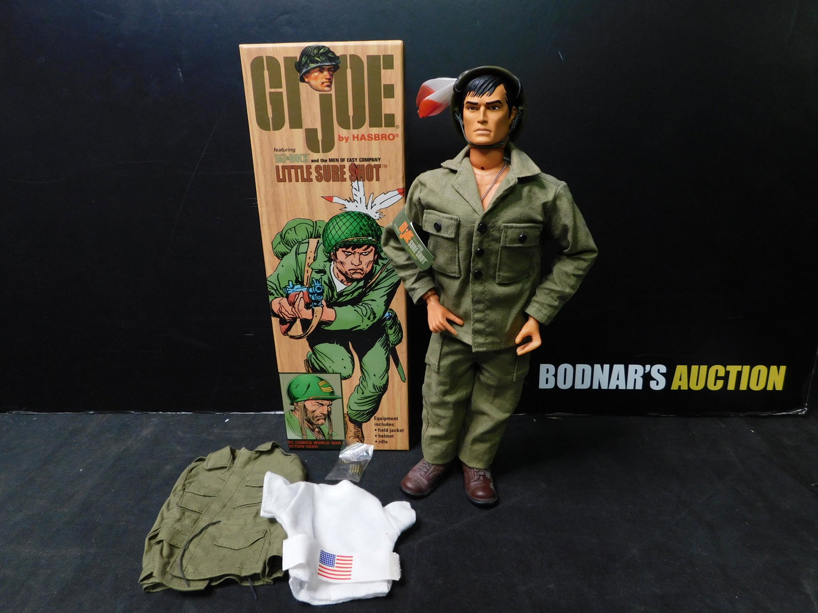 GI Joe Little Sure Shot in Box: GI Joe 12" Figure featuring Sgt. Rock and Easy Company Little Sure Shot. Hasbro/DC Comics 2002. You are bidding at a live sale, please read the terms and conditions. We are offering contact-less pick 