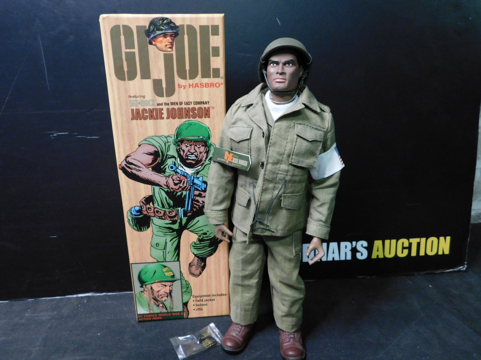 GI Joe Jackie Johnson Figure in Box: GI Joe 12" Figure featuring Sgt. Rock and Easy Company Jackie Johnson in Box. Hasbro/DC Comics 2002. You are bidding at a live sale, please read the terms and conditions. We are offering contact-less 