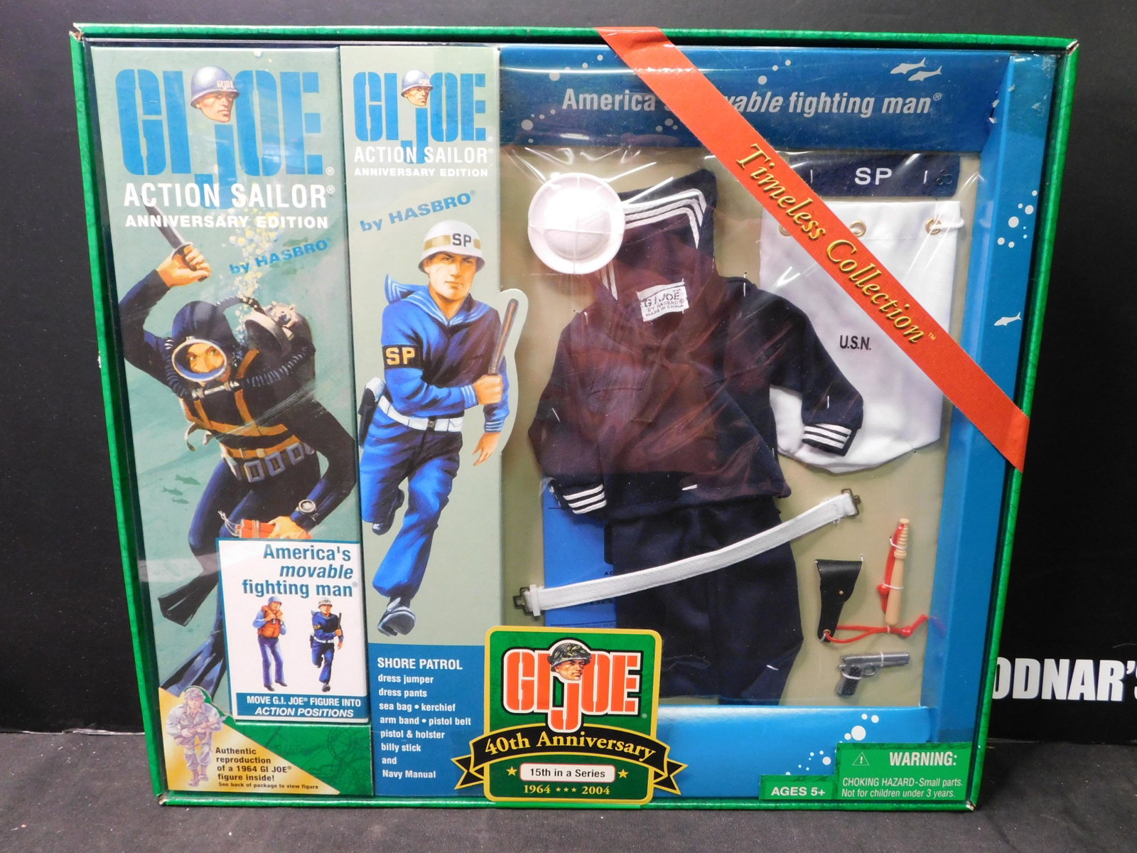 GI Joe Action Sailor Shore Patrol Set 40th Anniversary: GI Joe 40th Anniversary 12" Action Sailor Shore Patrol Set. 15th in a Series. In Box. Hasbro 2003. You are bidding at a live sale, please read the terms and conditions. We are offering contact-less pi
