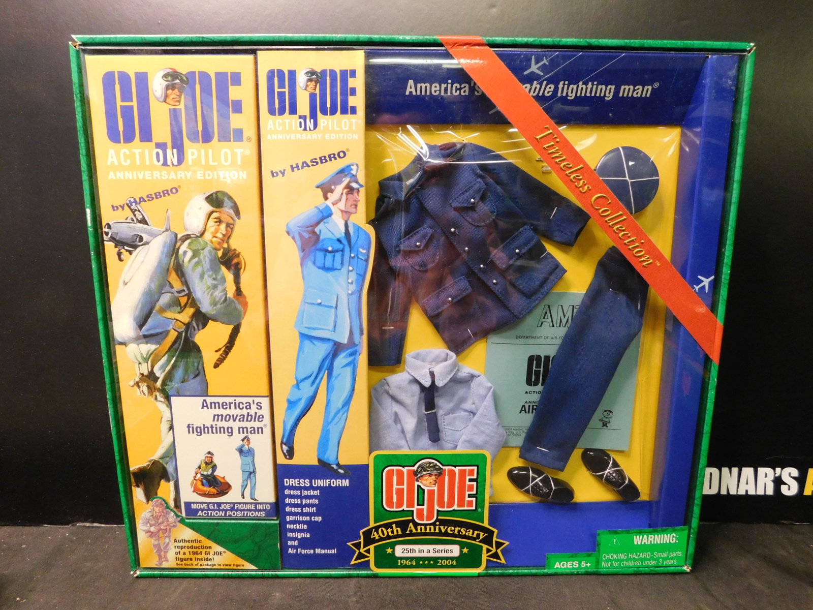 GI Joe Action Pilot Dress Uniform Set 40th Anniversary: GI Joe 40th Anniversary 12" Action Pilot Dress Uniform Set. 25th in a Series. In Box. Hasbro 2005. You are bidding at a live sale, please read the terms and conditions. We are offering contact-less pi