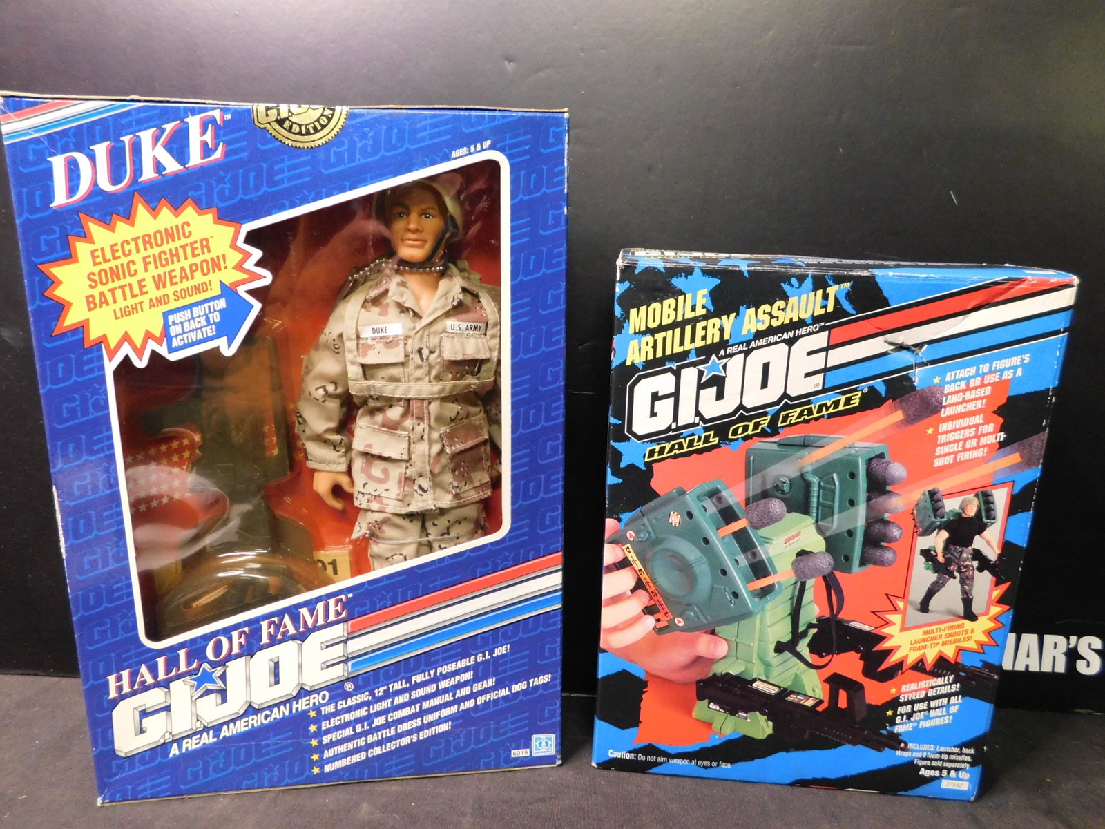 GI Joe Hall of Fame Lot of 2 including Duke: GI Joe Hall of Fame Lot of 2. Included in this lot are Duke 12" Figure and Mobile Artillery Assault. You are bidding at a live sale, please read the terms and conditions. We are offering contact-less 