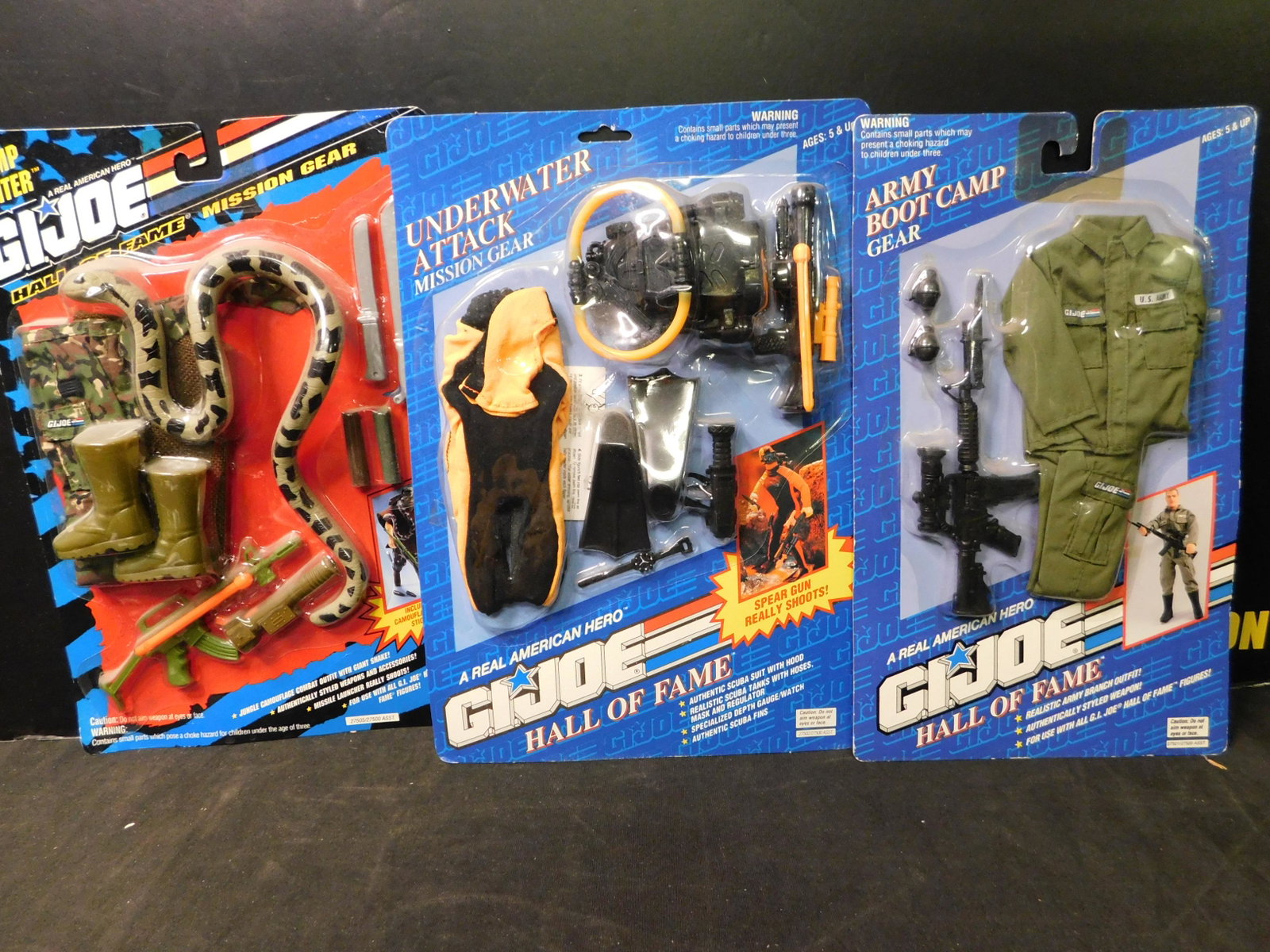 GI Joe Hall of Fame Accessories Lot of 3: Lot of 3 GI Joe Hall of Fame Accessories. Included in this lot are Army Boot Camp Gear, Underwater Attack Mission Gear and Swamp Fighter. You are bidding at a live sale, please read the terms and cond