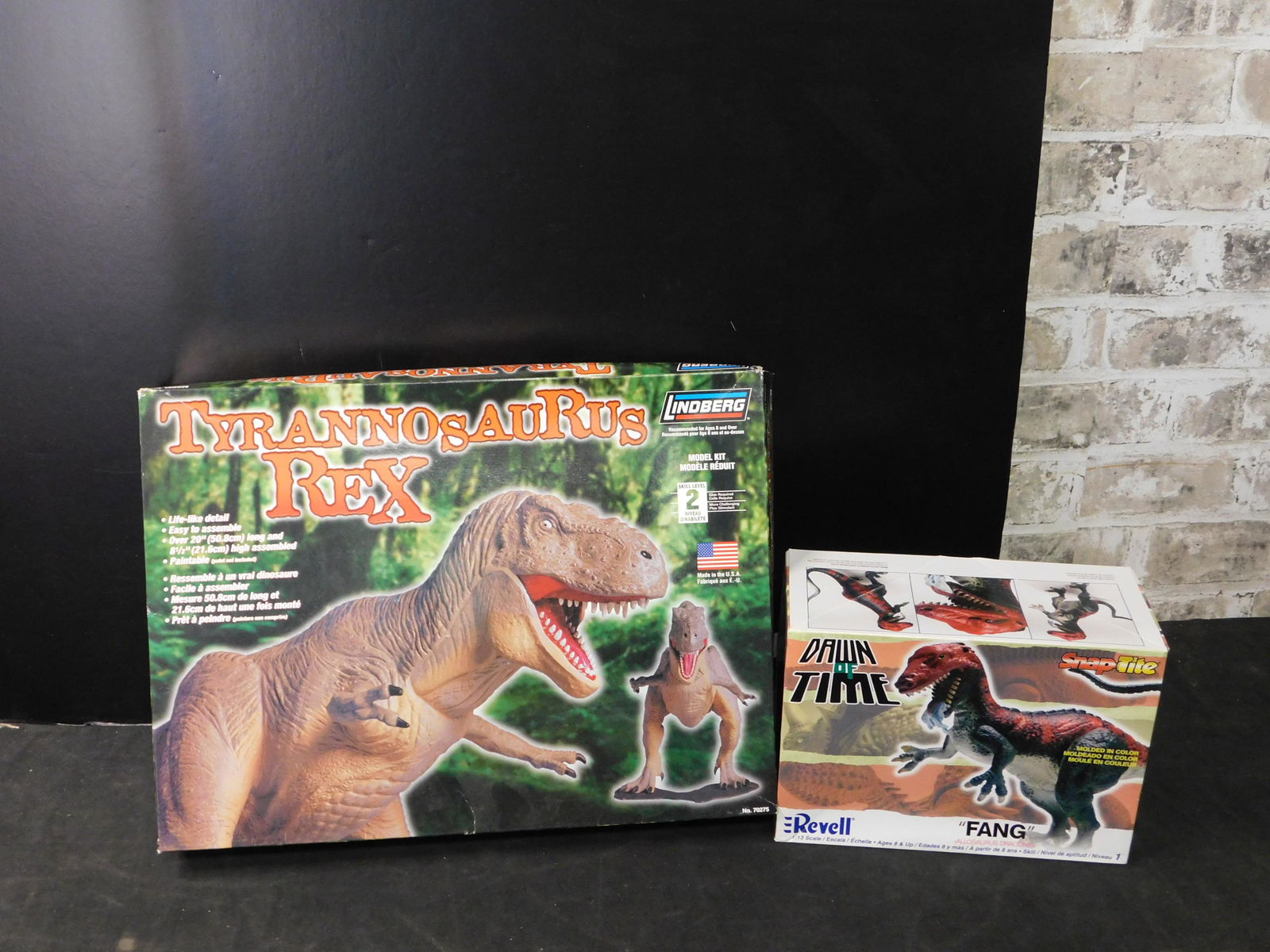 Lot of 2 Dinosaur Model Kits T-Rex and Fang: Lot of 2 Model Kits. Included in this lot are Lindberg Tyrannosaurus Rex and Revell Fang. All from private collector who disclosed to us that he just took off the factory seal to look at them and to t