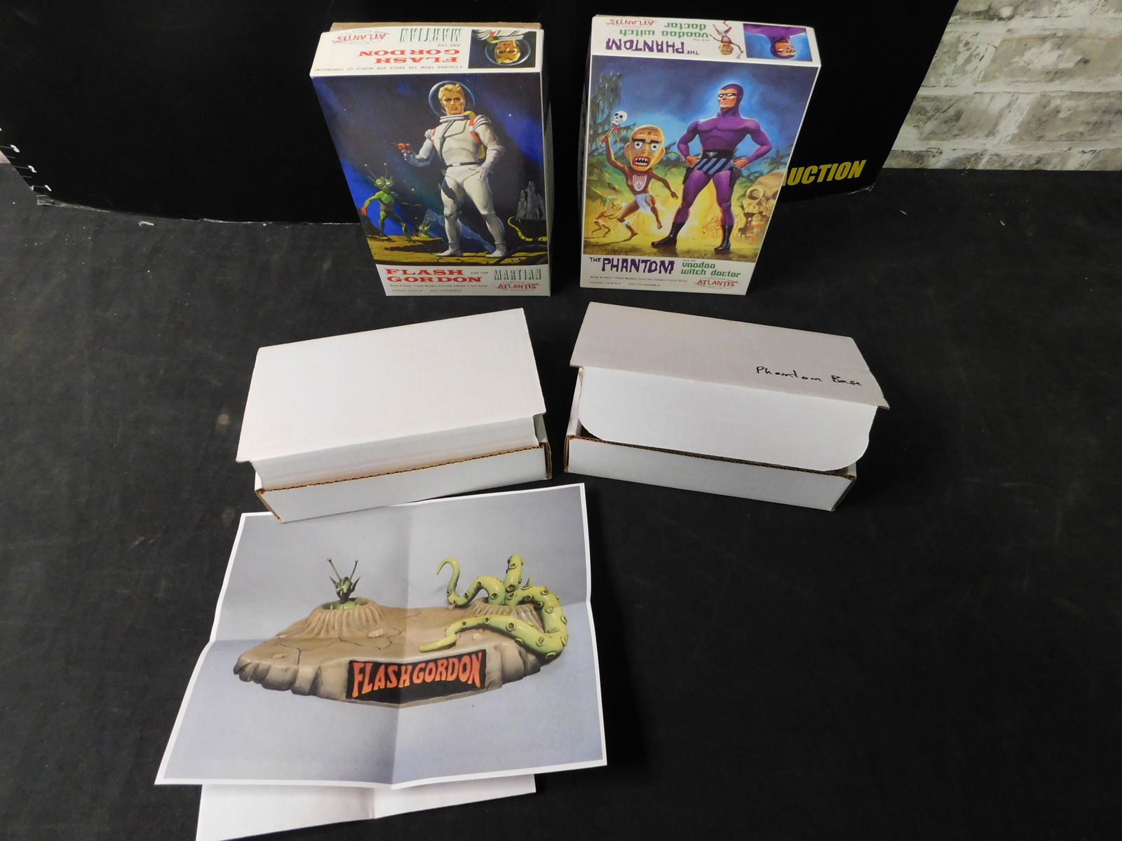 The Phantom and Flash Gordon Atlantis Model Kits with: Lot of 2 Atlantis Model Kits - The Phantom and the Voo Doo Witch Doctor with Base and Flash Gordon and the Martian with Base. All from private collector who disclosed to us that he just took off the f