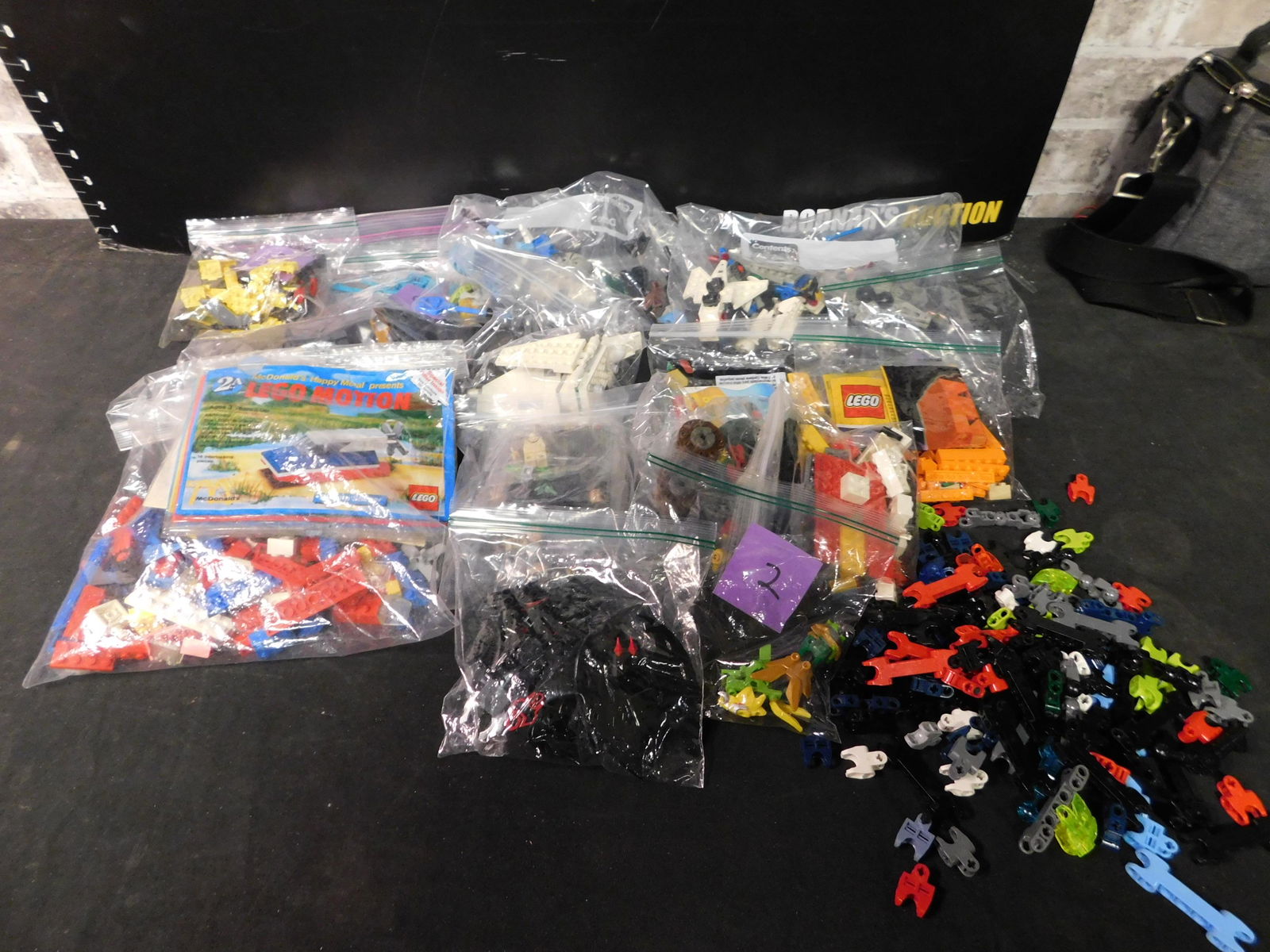 Box Lot of Loose Legos: Box Lot of Loose Legos. The Legos came from a collector's estate. He had them displayed and for selling purposes he took them apart and put them back into baggies. We can say we are pretty sure they a