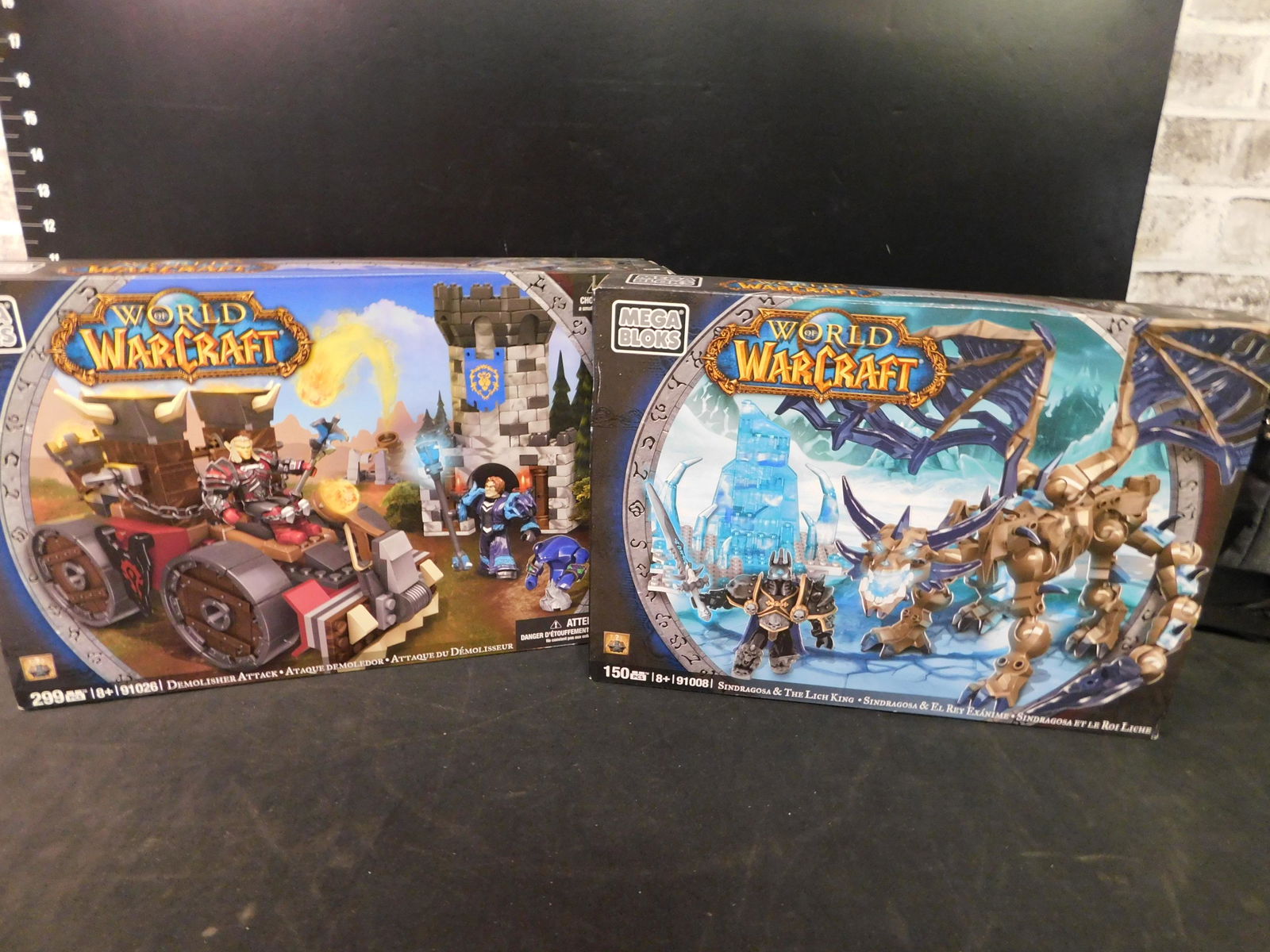 World of Warcraft Megabloks Lot of 2: Lot of 2 World of Warcraft Mega Bloks including Sindragosa & The Lich King and Demolisher Attack. The Legos came from a collector's estate. He had them displayed and for selling purposes he took them