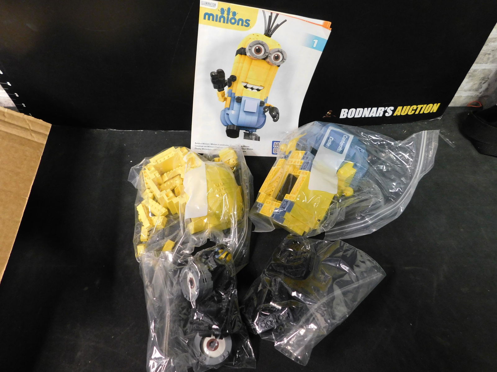 Mega Bloks Minion: Mega Bloks Minion. The Legos came from a collector's estate. He had them displayed and for selling purposes he took them apart and put them back into baggies. We can say we are pretty sure they are co