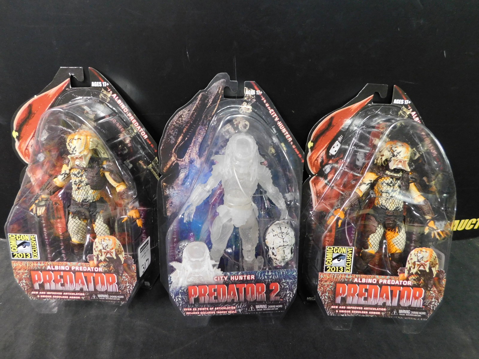 Neca Predator Figure Lot of 3 including Albino SDCC: Lot of 3 NECA Predator Figures. Included in this lot are 2x Albino Predator SDCC Exclusive and 1 City Hunter. You are bidding at a live sale, please read the terms and conditions. We are offering cont