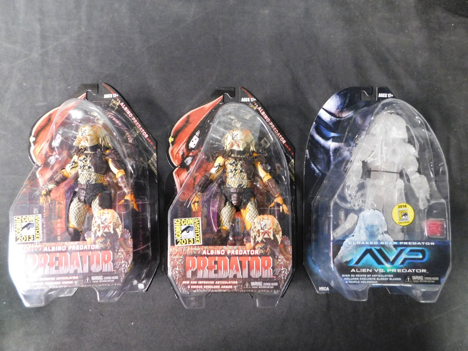 Neca Predator Figure Lot of 3 including Albino SDCC: Lot of 3 NECA Predator Figures. Included in this lot are 2x Albino Predator SDCC Exclusive and 1 City Hunter. You are bidding at a live sale, please read the terms and conditions. We are offering cont