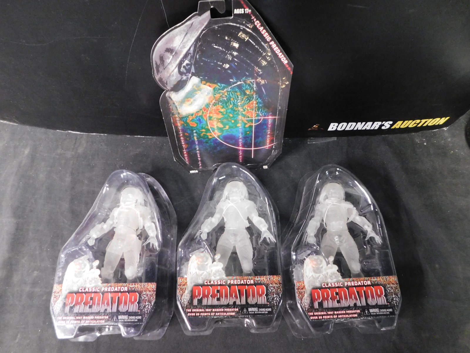 Lot of 3 Neca Classic Predator Figures: Lot of 3 Neca Classic Predator Figures. 2 do not have card backs - only the blister pack. 1 is unattached from the card back. You are bidding at a live sale, please read the terms and conditions. We a