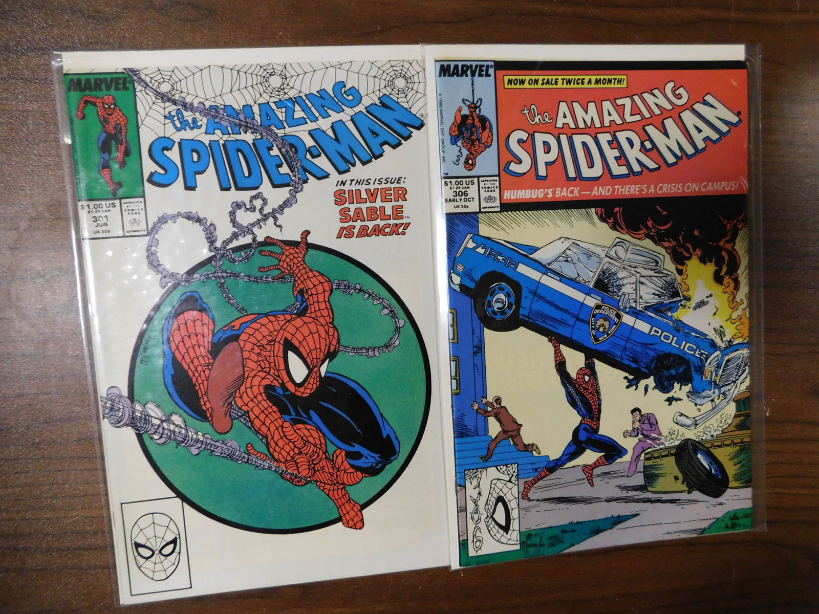 Amazing Spider-Man #301 and #306.: Amazing Spider-Man #301 and #306. This sale will be broadcast live on sale day with an auctioneer and caller calling full descriptions of each lot being sold, as well as video feed of each lot. All it