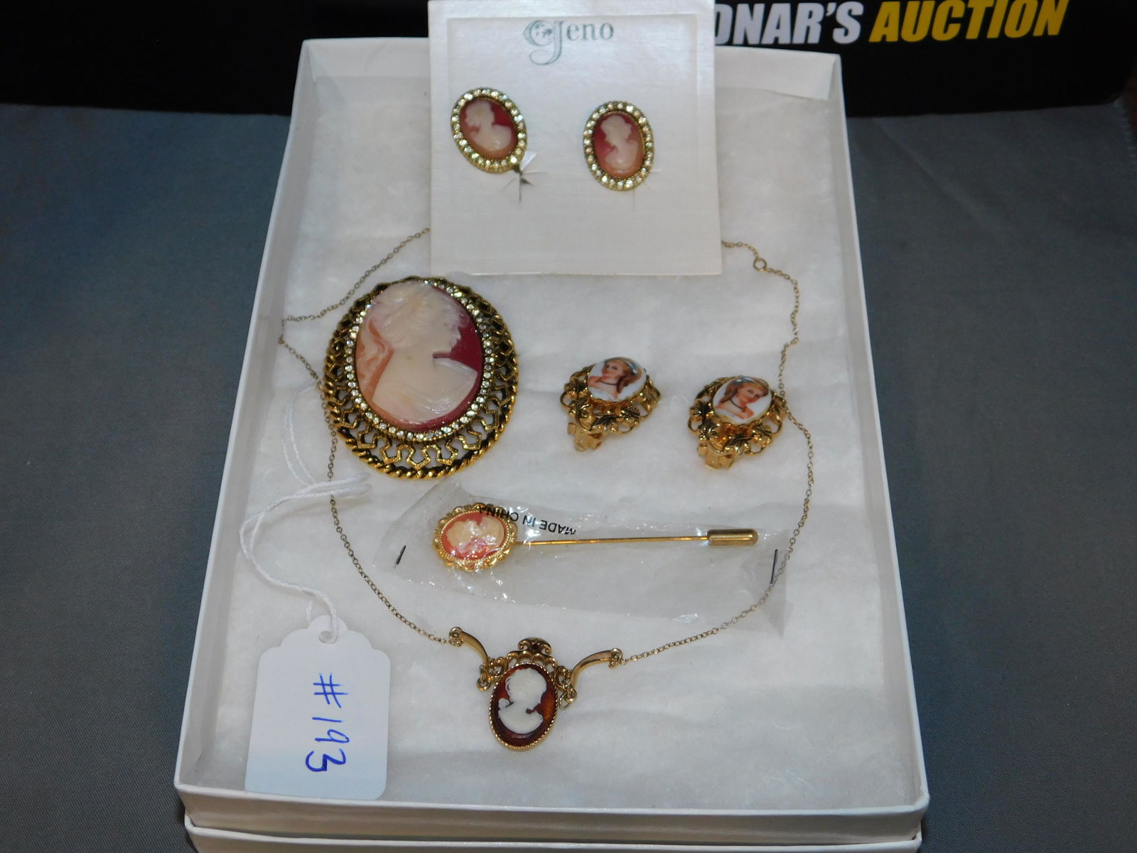 Lot of Cameo Jewelry: Lot of gold tone cameo jewelry. Necklace is 20" long. You are bidding at a live sale, please read the terms and conditions. We are offering contact-less pick ups at our South Brunswick location by APP
