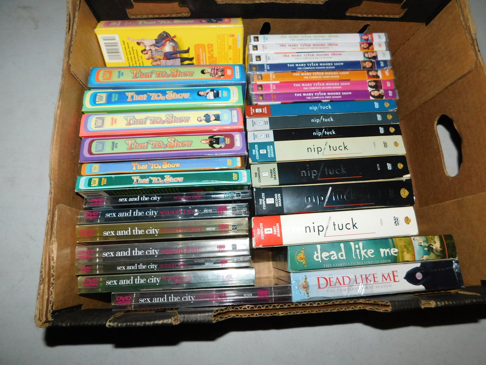 Large Lot of DVD's TV Show Seasons: Lot of DVD's TV Show Seasons including full series run of Sex and the City, That 70's Show, Nip Tuck and the Mary Tyler Moore show DVD sets. This sale will be broadcast live on sale day with an auctio