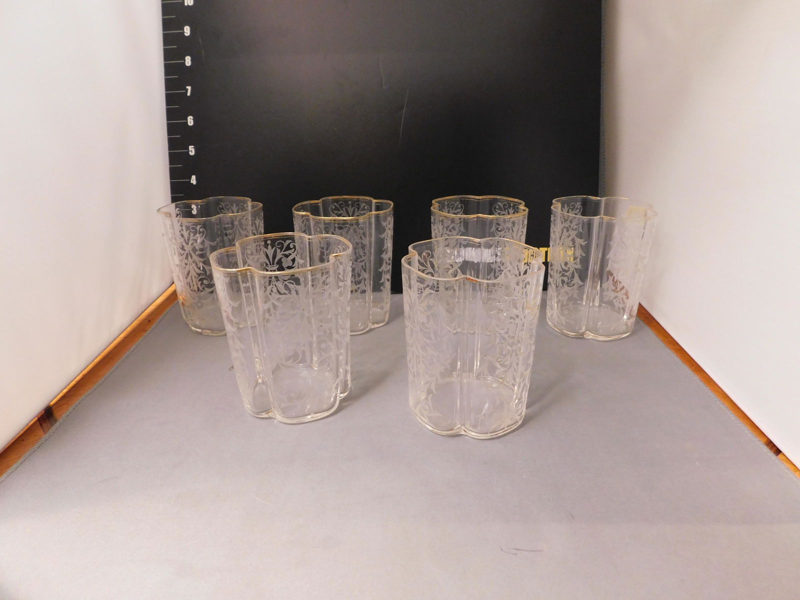 Set of 6 Early Etched Lemonade Glasses: Set of 6 early etched lemonade glasses, possible Moser. Had gold leafing that has come off over time. Measures approx. 4" tall. You are bidding at a live sale, please read the terms and conditions. We