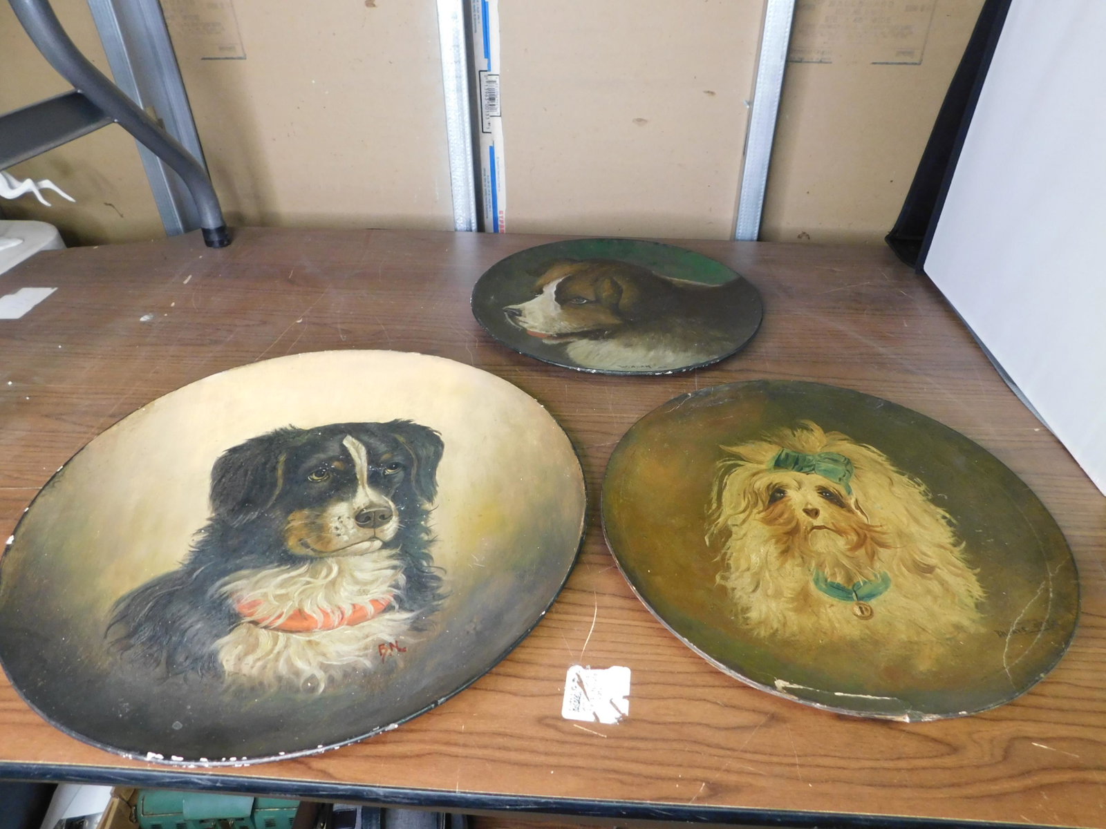 Lot of 3 19th Century Oil on Paper Mache Dog Portraits: Lot of 3 19th Century Oil on Paper Mache Plate Portraits of Dogs. Includes one signed B.N. Measures 16.5" d. One W.Adam 89 12" diameter. One AS-IS R.H. Days '92. Measures 13" diameter. You are bidding