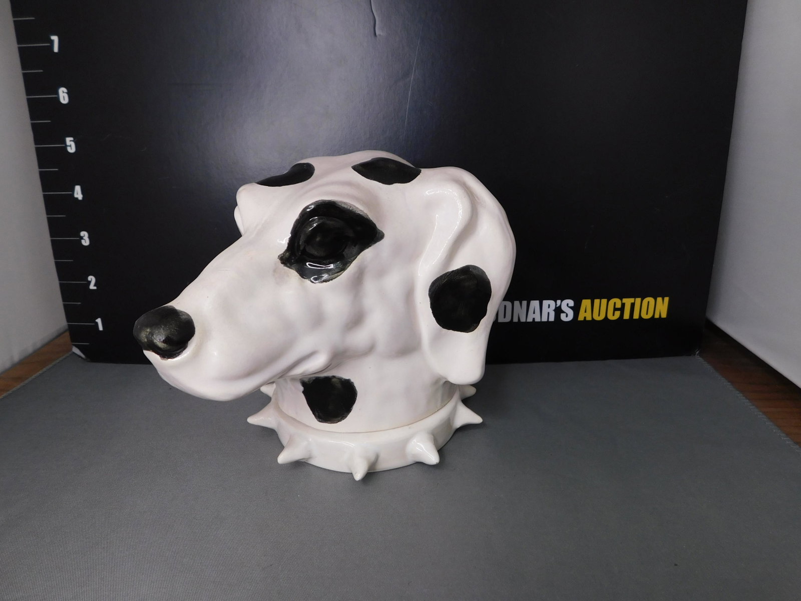 French Porcelain Dalmatian Head Covered Cup: French Porcelain/Pottery Dalmatian Head Covered Cup. Signed J. Roger Harris. Measures 5" tall x 6" long. You are bidding at a live sale, please read the terms and conditions. We are offering contact-l