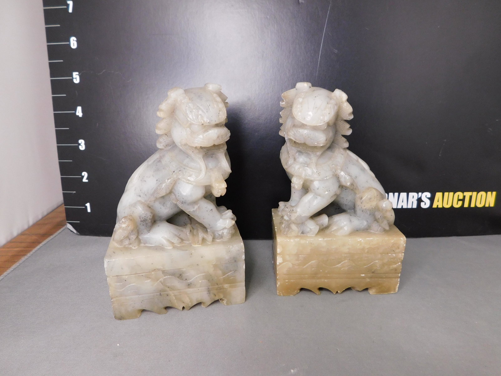 Pair of Hand Carved Foo Dogs: Pair of Hand Carved Soapstone Foo Dogs. Measures 5" tall. You are bidding at a live sale, please read the terms and conditions. We are offering contact-less pick ups at our South Brunswick location by