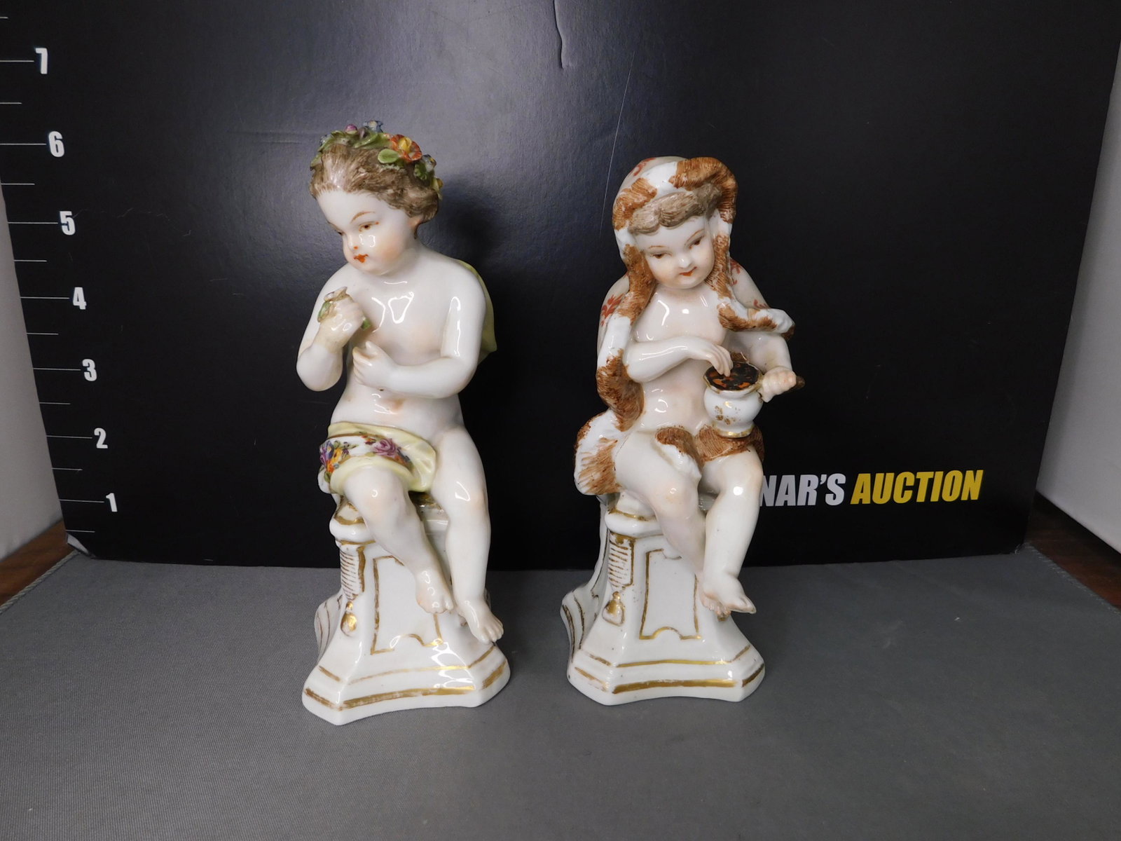 Pair of 19th Century Hand painted Figurines: Pair of 19th Century Hand painted Porcelain Statues on Pedestal Base. In the manner of Sampson. Measures 6" tall. You are bidding at a live sale, please read the terms and conditions. We are offering 