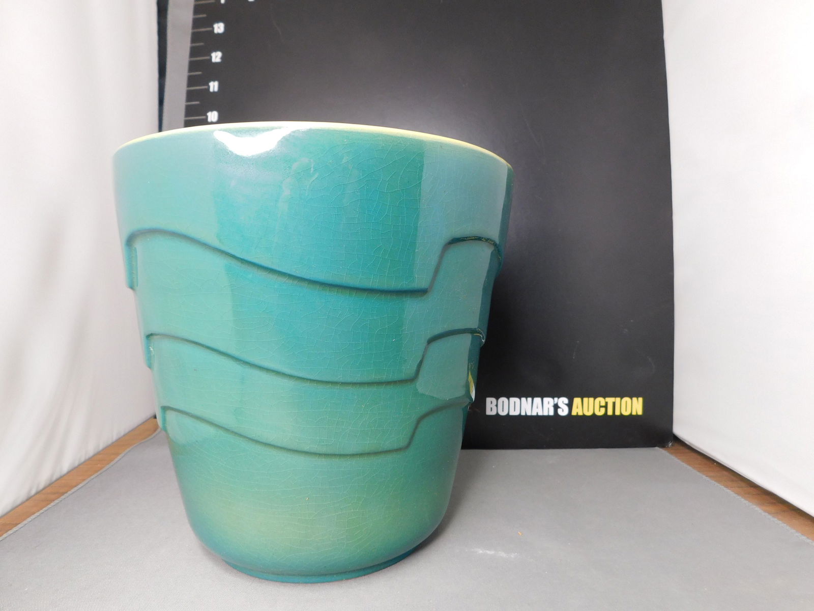 Roseville Art Deco Planter: Roseville Planter Art Deco Style. Measures 7" tall x 7" w. Marked R 73-6 USA. You are bidding at a live sale, please read the terms and conditions. We are offering contact-less pick ups at our South B