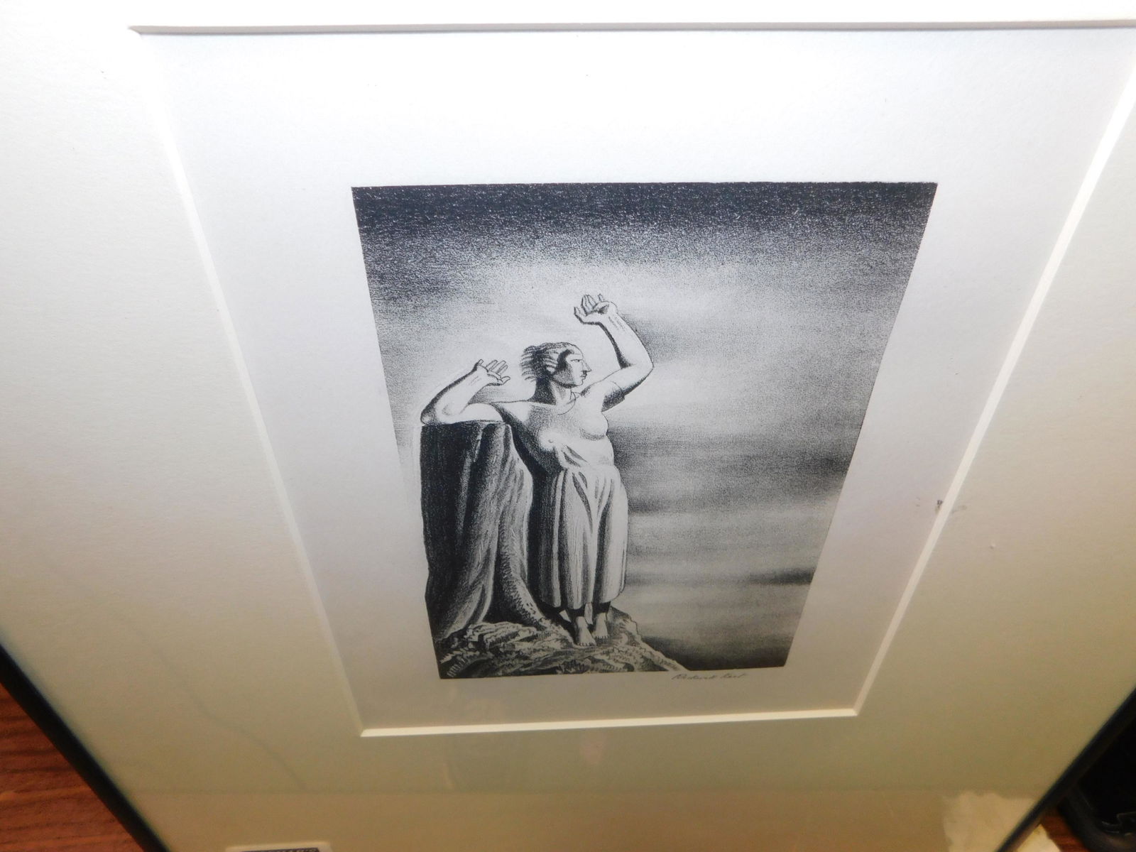 Art Deco Lithograph Signed Rockwell Kent - Farewell: Framed Art Deco Lithograph Signed Lower Right Rockwell Kent. Farewell, 1931. Depicts a mythological woman/man standing over a ledge. Image measures 8" x 6". You are bidding at a live sale, please read