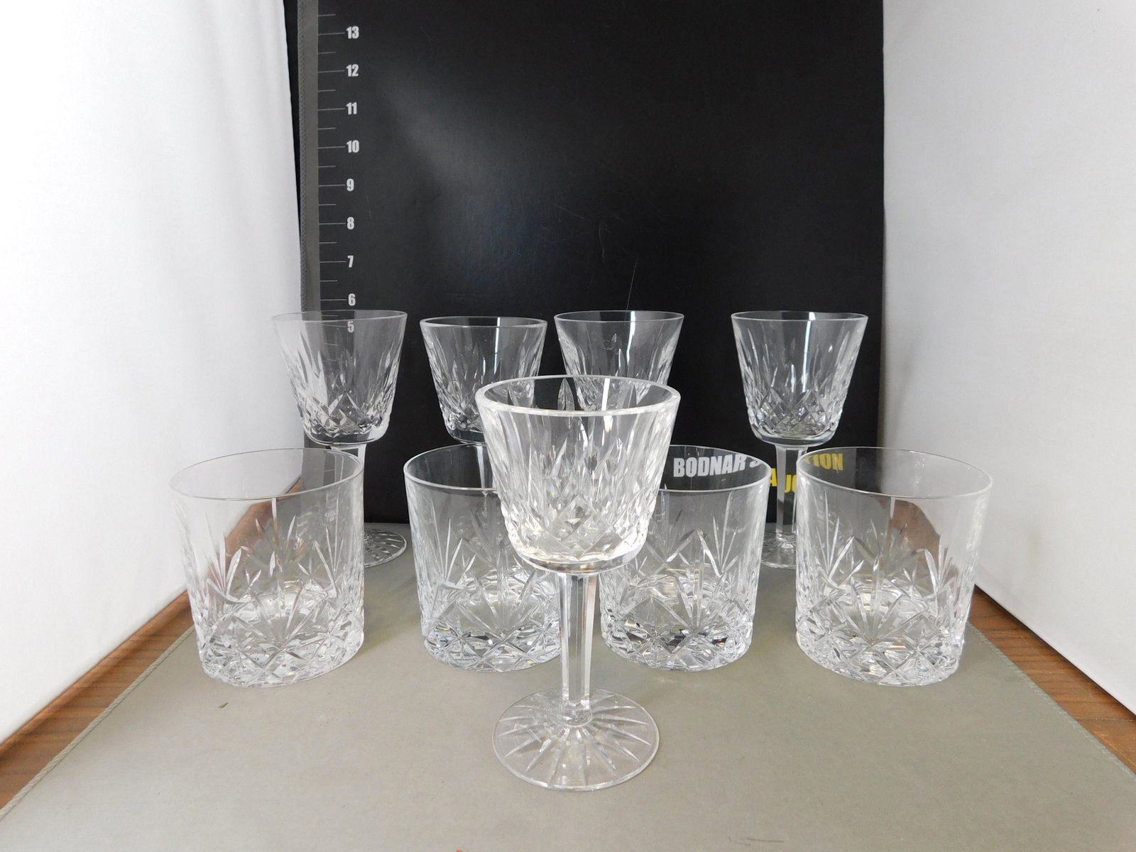 Mixed Waterford Crystal Lot - 9 Pcs: Mixed Waterford Lot of 9 Pieces. Included are 4 Rocks Glasses, 4 Wine Glasses and 1 Cordial Glass. You are bidding at a live sale, please read the terms and conditions. We are offering contact-less pi