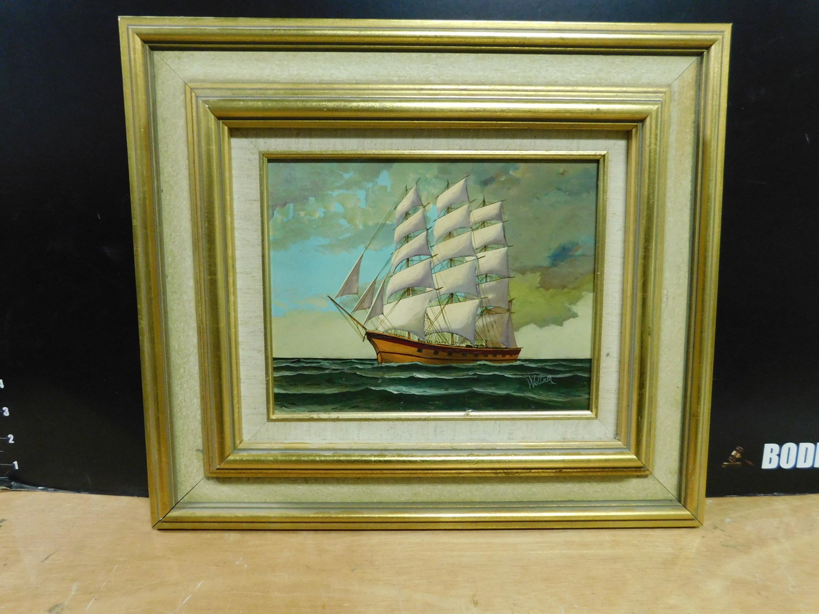 Oil on Board of Friggot Sailing Ship: Oil on Board Friggot Sailing Ship. Artist Signed Wollner. Measures 15" tall x 17.5" wide. You are bidding at a live sale, please read the terms and conditions. We are offering contact-less pick ups at