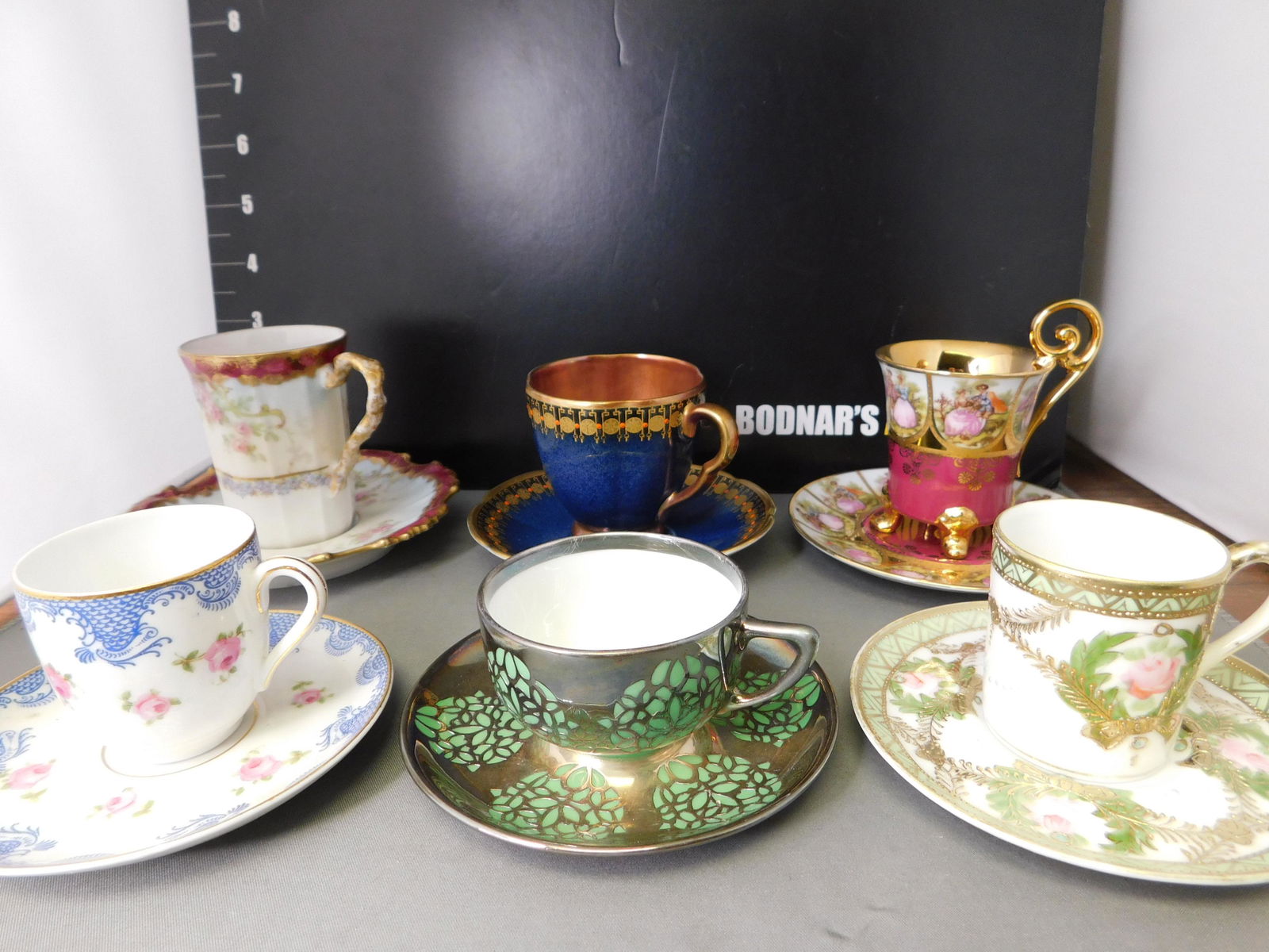 Teacup and Saucer Group Lot of 6: Lot of 6 Teacups and Saucers. Included in this lot are Limoges, Carlton ware, DW Porzellan, Spahr, Rosenthal and Nippon. You are bidding at a live sale, please read the terms and conditions. We are of