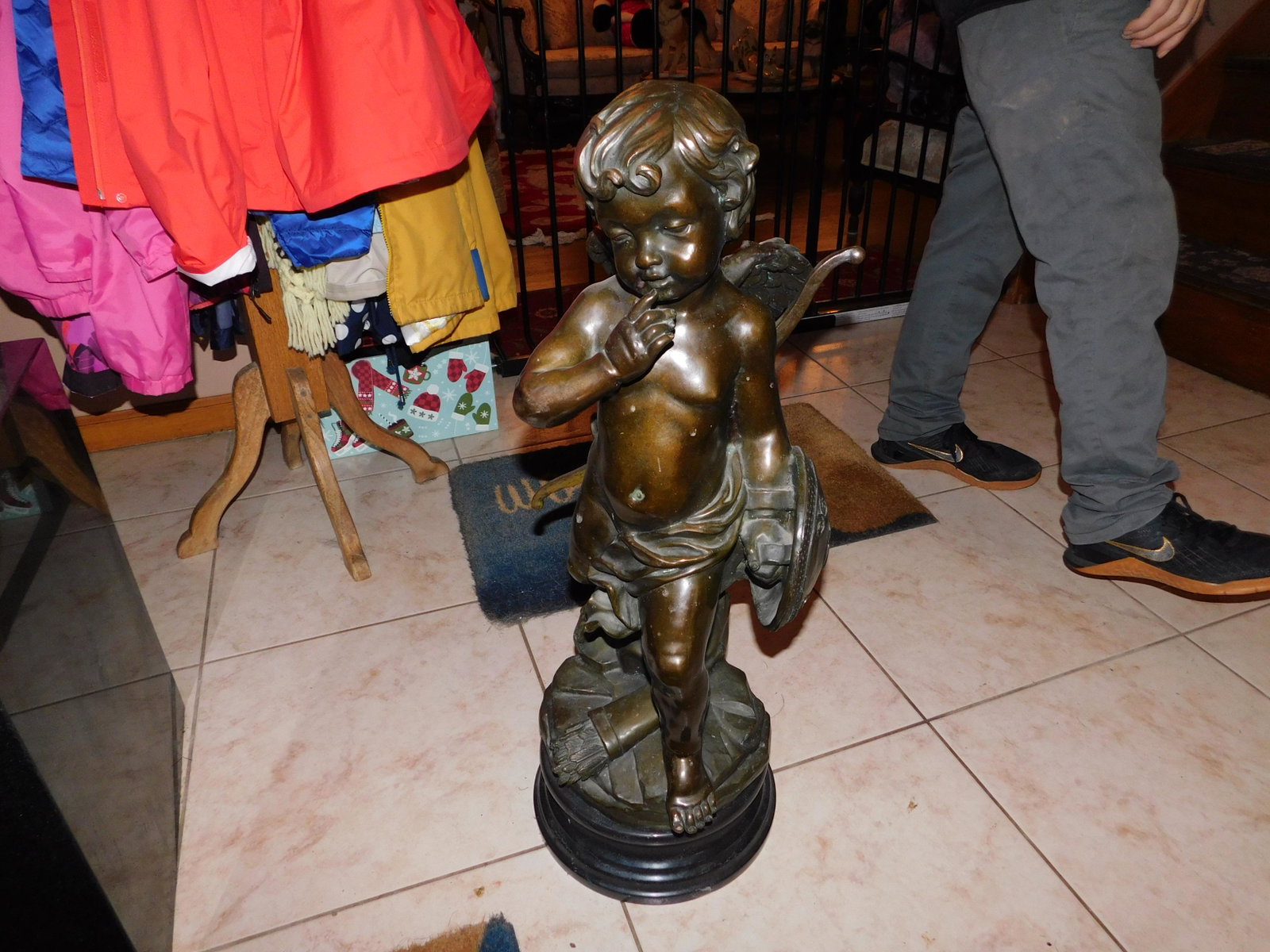 Bronze Statue of Cupid on Marble Base: Bronze Statue of Cupid on Marble Base. Measures 29" tall. You are bidding at a live sale, please read the terms and conditions. We are offering contact-less pick ups at our South Brunswick location by