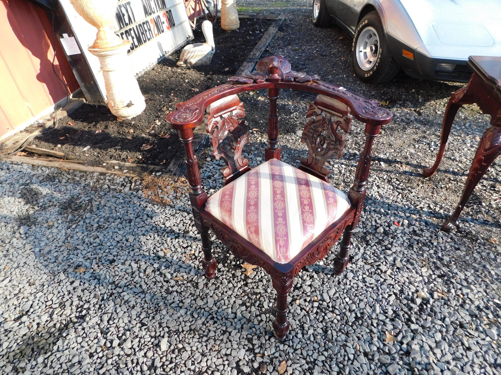 Newer carved figural corner chair: Newer carved figural corner chair. This sale will be broadcast live on sale day with full descriptions of each lot being sold, as well as video feed of each lot. All items MUST be paid for within 48 H
