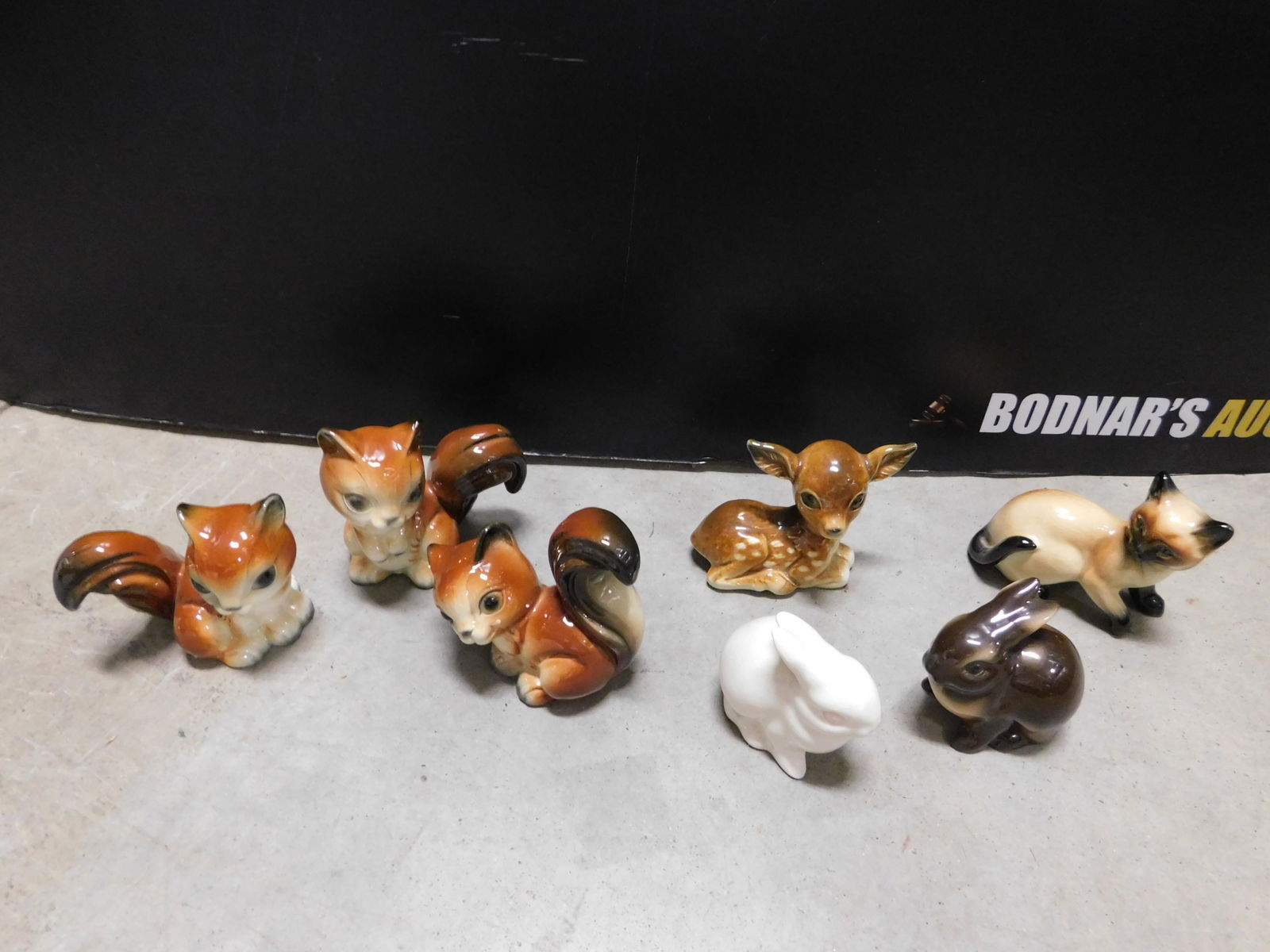 Lot of 7 Goebel Animal Figurines: Lot of 7 Goebel Animal Figurines. This sale will be broadcast live on sale day with full descriptions of each lot being sold, as well as video feed of each lot. All items MUST be paid for within 24 HO