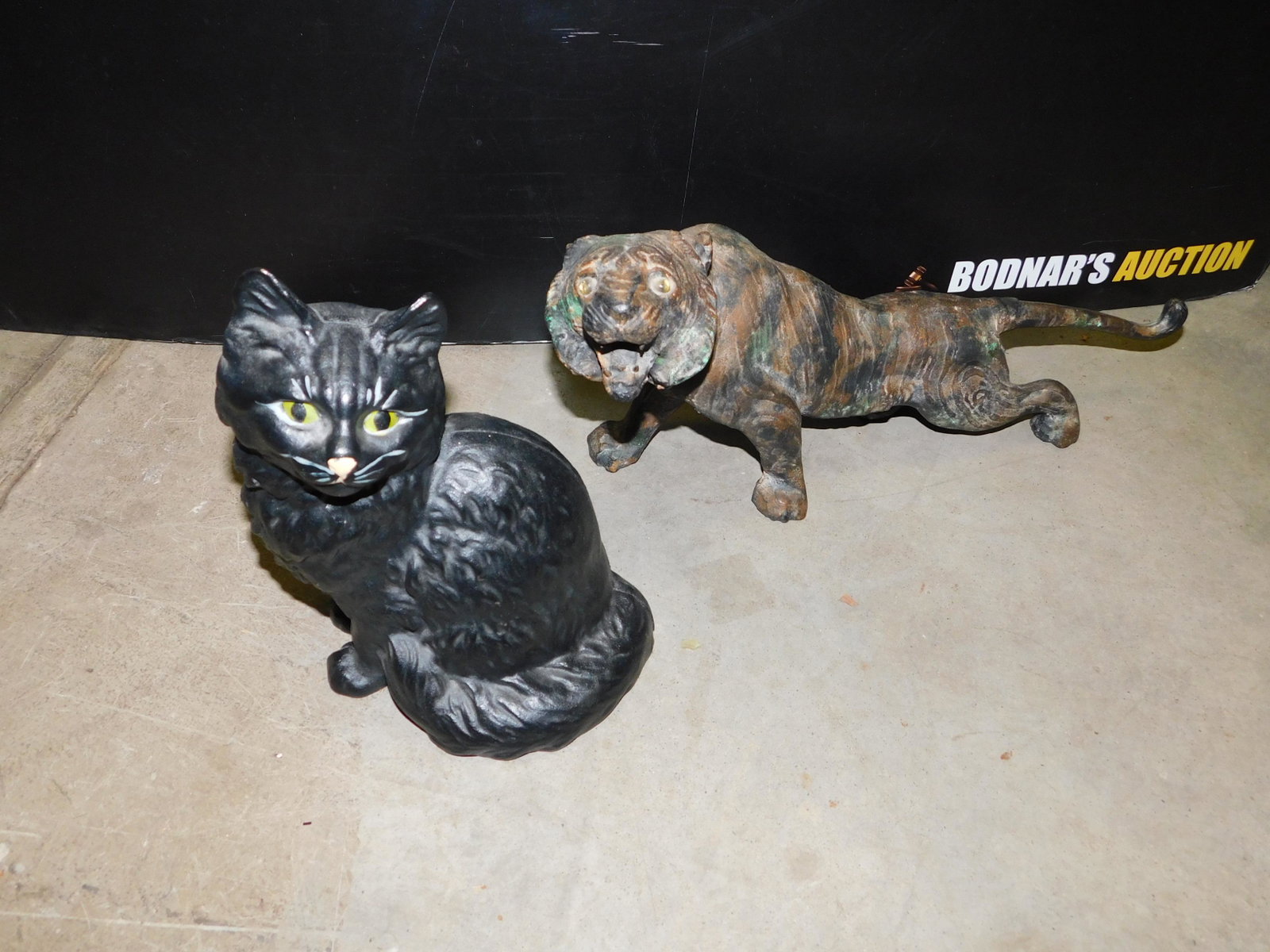 Lot of 2 Cast Iron Door Stops: Lot of 2 Cast Iron Door Stops. This sale will be broadcast live on sale day with full descriptions of each lot being sold, as well as video feed of each lot. All items MUST be paid for within 24 HOURS
