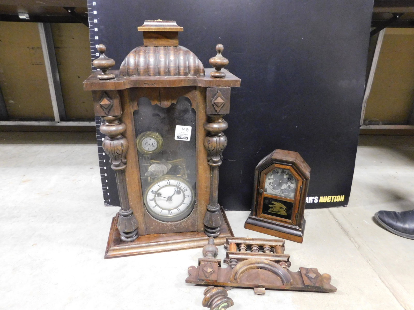 Lot of 2 Clocks: Lot of 2 Clocks. One Regulator and the other is a mantle clock. Regulator needs some TLC. Most pieces are here...just need to be reattached. This sale will be broadcast live on sale day with full desc