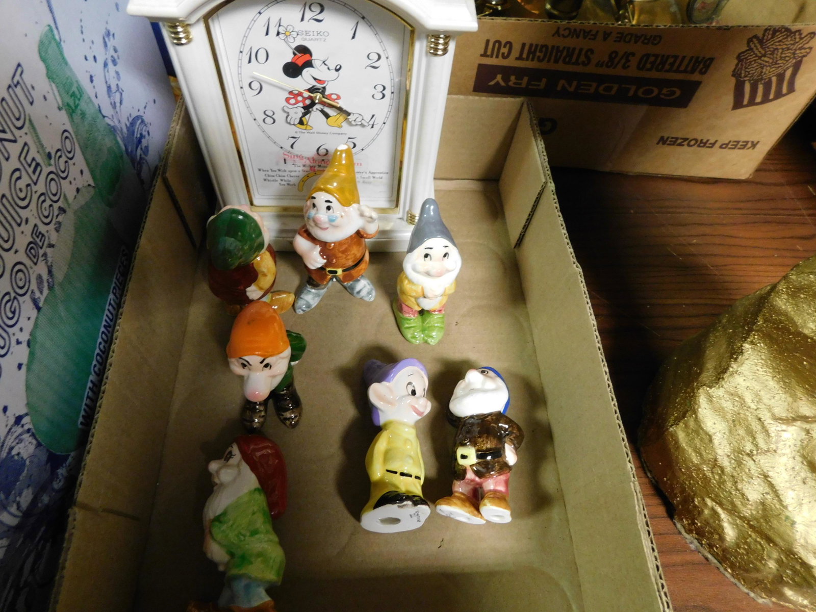 Disney Box Lot with Dwarfs and Minnie Clock: Disney Box Lot with Dwarfs and Minnie Clock. This sale will be broadcast live on sale day with full descriptions of each lot being sold, as well as video feed of each lot. All items MUST be paid for w