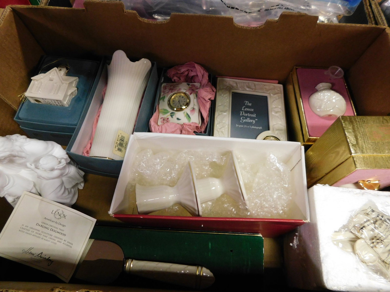 Box Lot of Decorative Lenox: Box Lot of Decorative Lenox. This sale will be broadcast live on sale day with full descriptions of each lot being sold, as well as video feed of each lot. All items MUST be paid for within 24 HOURS o