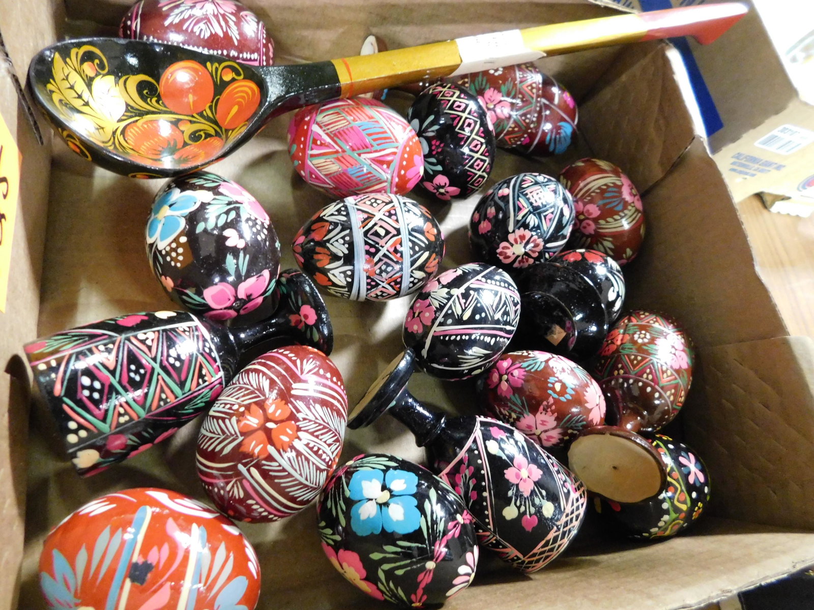 Box Lot of Hand painted Wooden Eggs and Cups: Box Lot of Hand painted Wooden Eggs and Cups. This sale will be broadcast live on sale day with full descriptions of each lot being sold, as well as video feed of each lot. All items MUST be paid for 