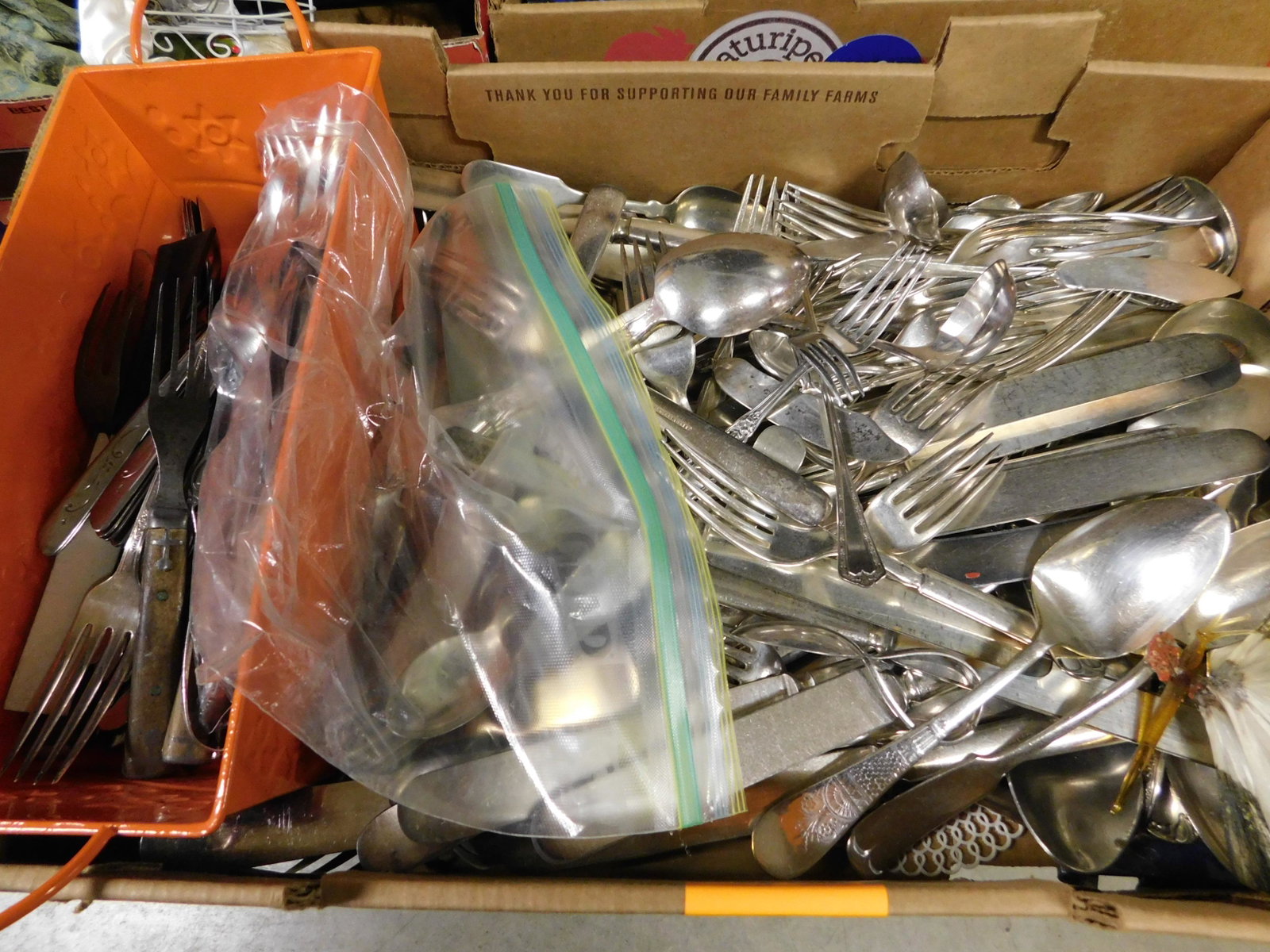 Box Lot of Flatware: Box Lot of Flatware. This sale will be broadcast live on sale day with an auctioneer and caller calling full descriptions of each lot being sold, as well as video feed of each lot. All items MUST be p