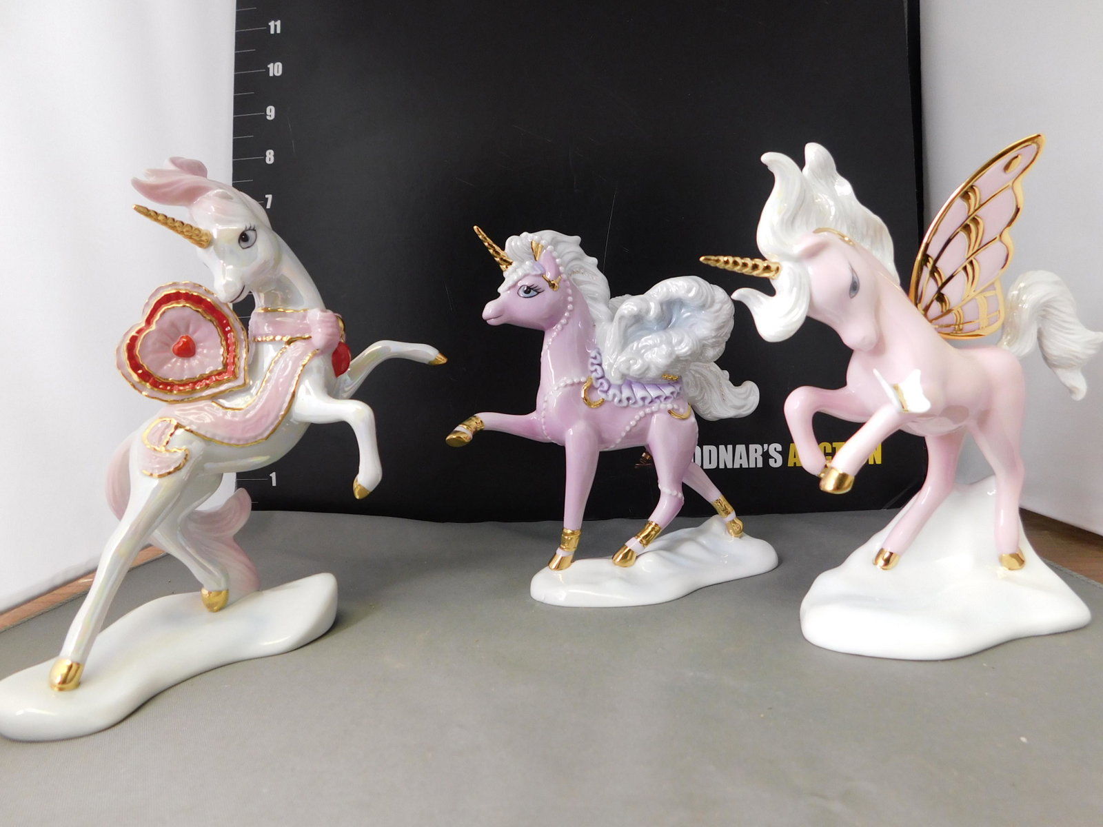 Lot of 3 Franklin Mint Unicorn Figures: Lot of 3 Franklin Mint Unicorn Figures. All come with Boxes. This sale will be broadcast live on sale day with an auctioneer and caller calling full descriptions of each lot being sold, as well as vid