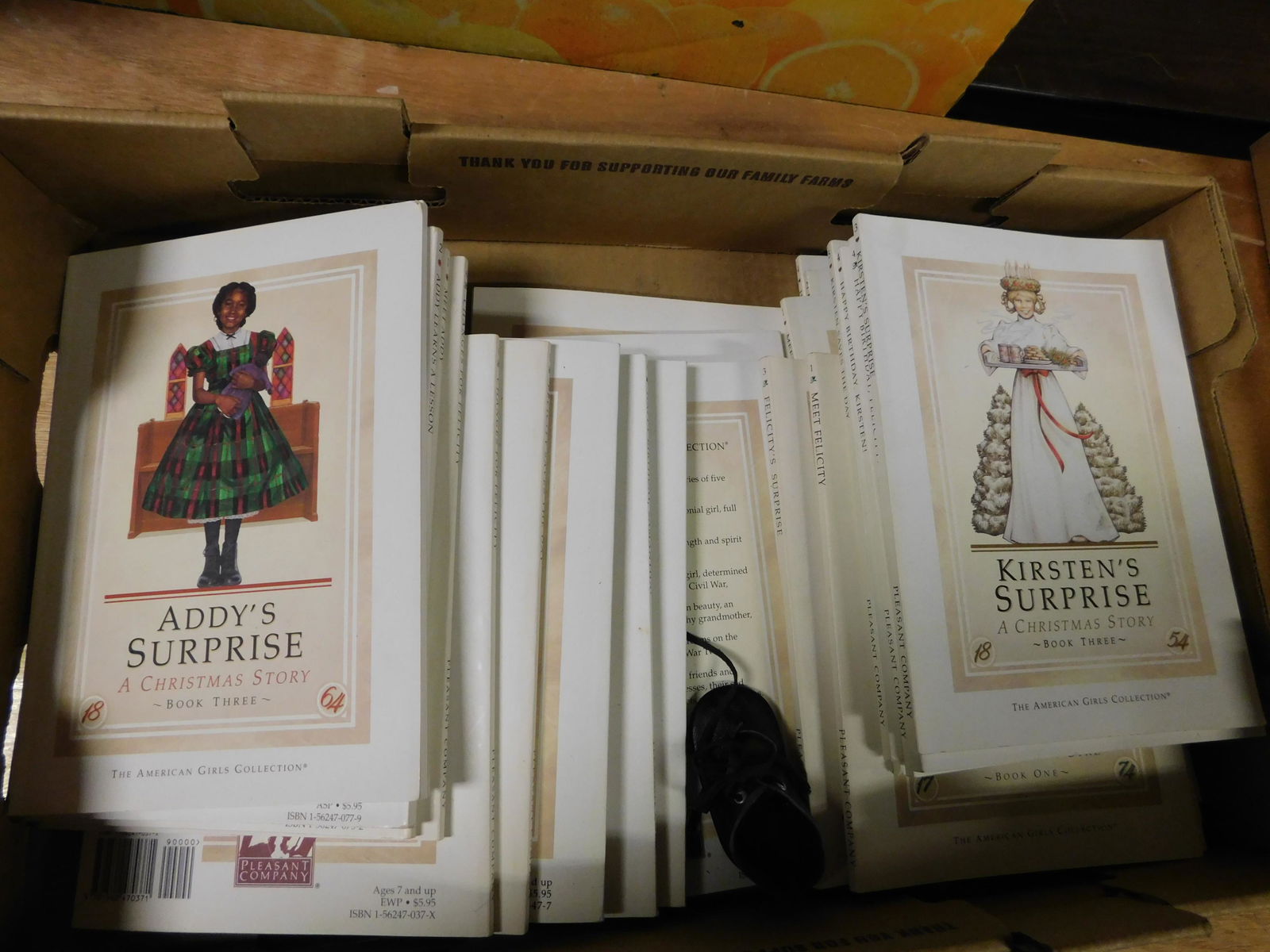 Box Lot with American Girl Books: Box Lot with American Girl Books. This sale will be broadcast live on sale day with an auctioneer and caller calling full descriptions of each lot being sold, as well as video feed of each lot. All it