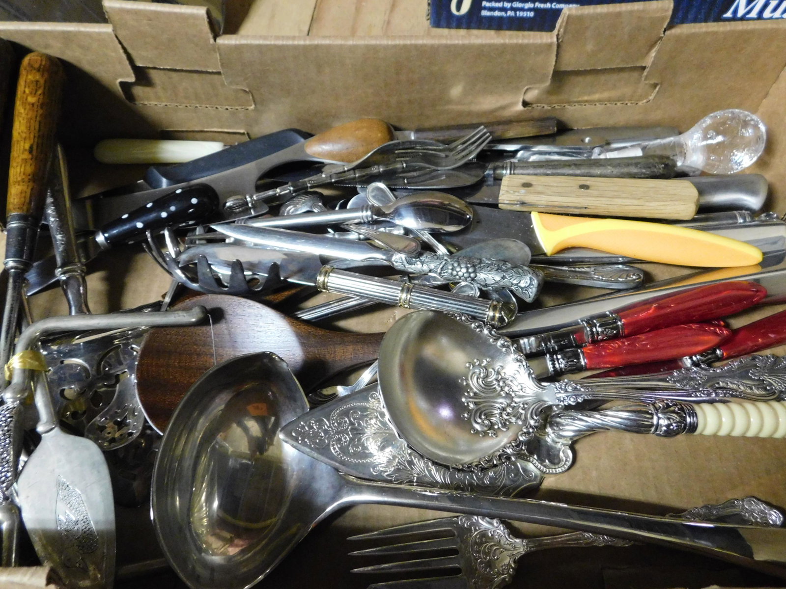 Box Lot of Flatware: Box Lot of Flatware. This sale will be broadcast live on sale day with an auctioneer and caller calling full descriptions of each lot being sold, as well as video feed of each lot. All items MUST be p