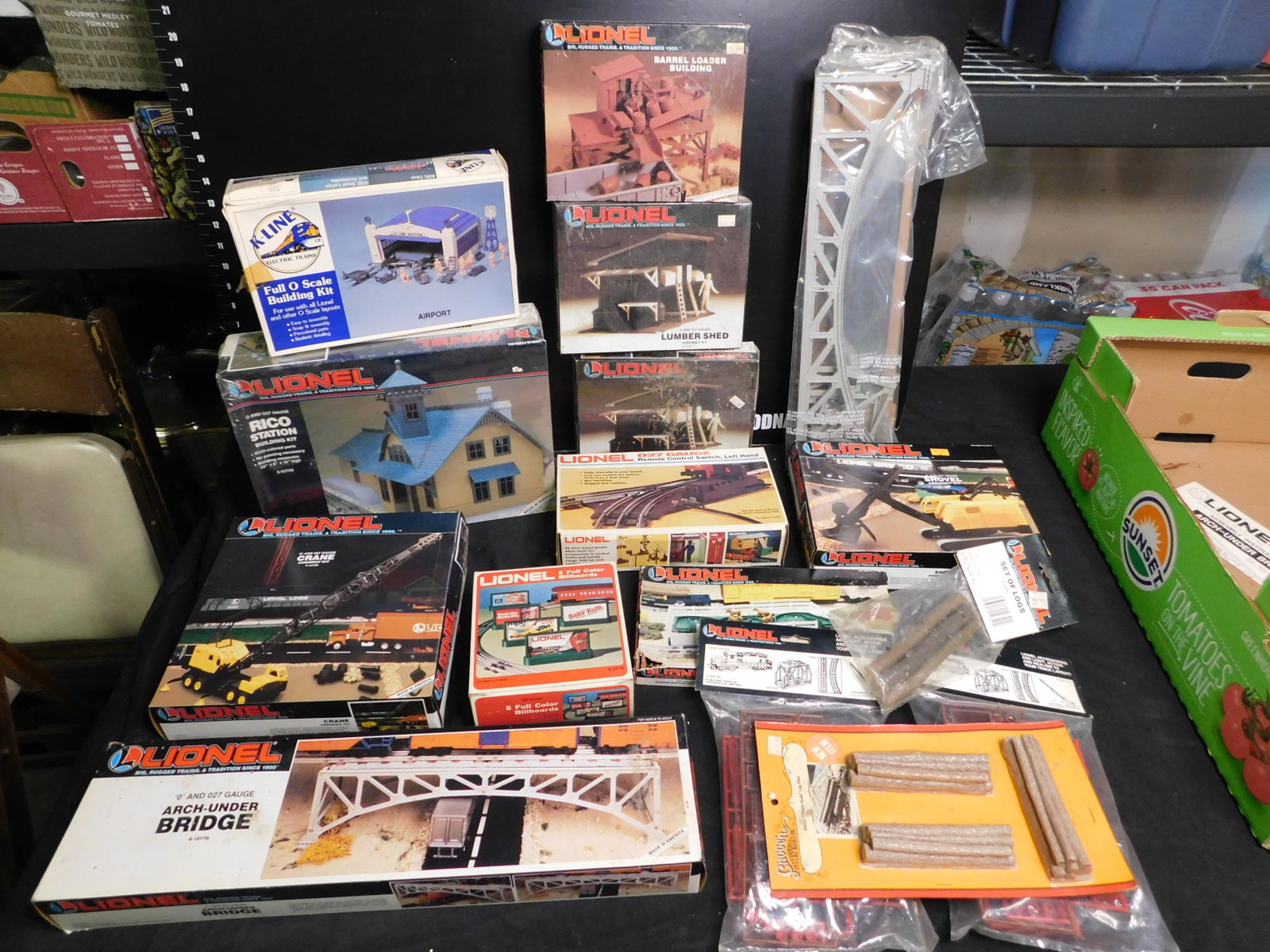 Large Grouping of Mostly Lionel Train Accessories: Large Grouping of Mostly Lionel Accessories and Buildings including Rico Station 62709, Construction Crane 12750, Remote Control Switch 5121 Left Hand, Steam Shovel 12751, Arch Under Bridge 12770, Bil
