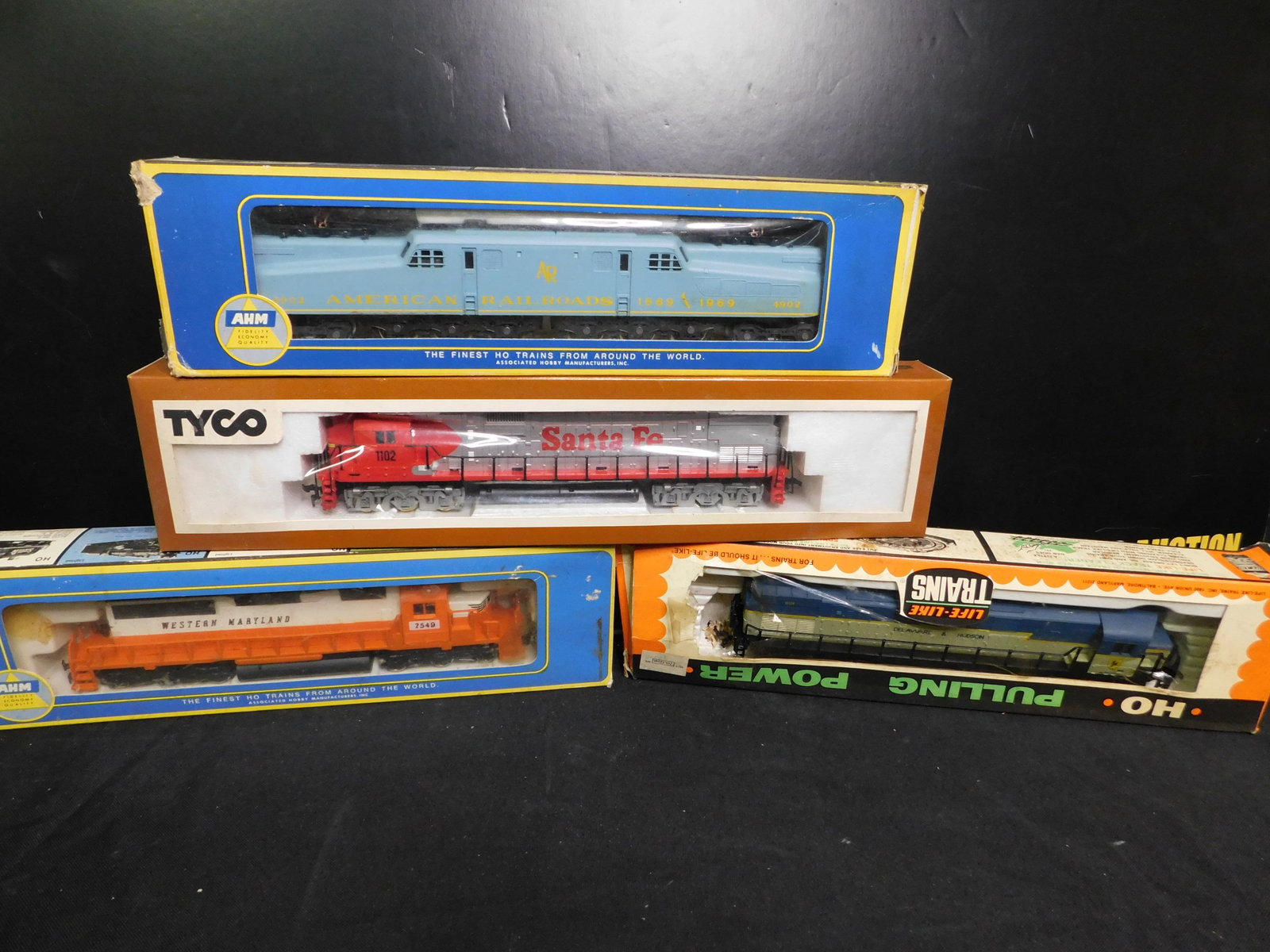 HO Scale Engines - Lot of 4: Lot of 4 HO Scale Engines. Including AHM GG-1, TYCO Santa Fe Diesel Engine, Life-like Delaware and Hudson Diesel and AHM Western Maryland Diesel. You are bidding at a live sale, please read the terms 