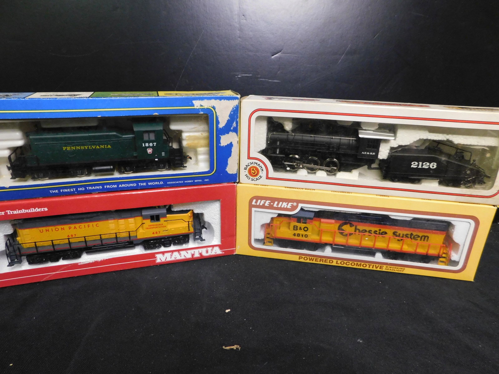 HO Scale Diesel Engines - Lot of 4: Lot of 4 HO Scale Diesel Engines including Life-like Chelsie System, Bachmann 060 Steam Engine, Mantua Union Pacific, AHM Pennsylvania. You are bidding at a live sale, please read the terms and condit