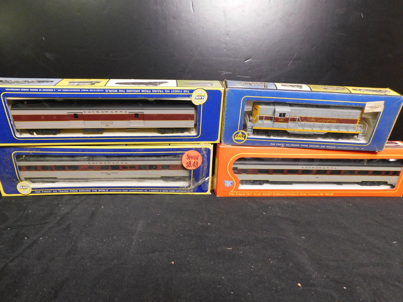 Lot of 4 HO Scale Engine with Passenger Cars: Lot of 4 HO Scale Engine with Passenger Cars. Included in this lot are Erie Lackawanna Diesel, 2 AHM Passenger Cars and IHC Passenger Car. You are bidding at a live sale, please read the terms and con