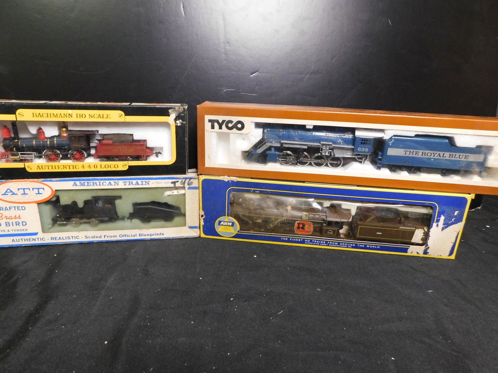 HO Scale Engines - Lot of 4: Lot of 4 HO Scale Engines including TYCO Royal Blue 280 Steam Engine, Bachmann 440 Union Pacific General Steam Engine, ATT 040 Steam Engine and AHM 262 Steam Engine - Wrong Box. You are bidding at a l