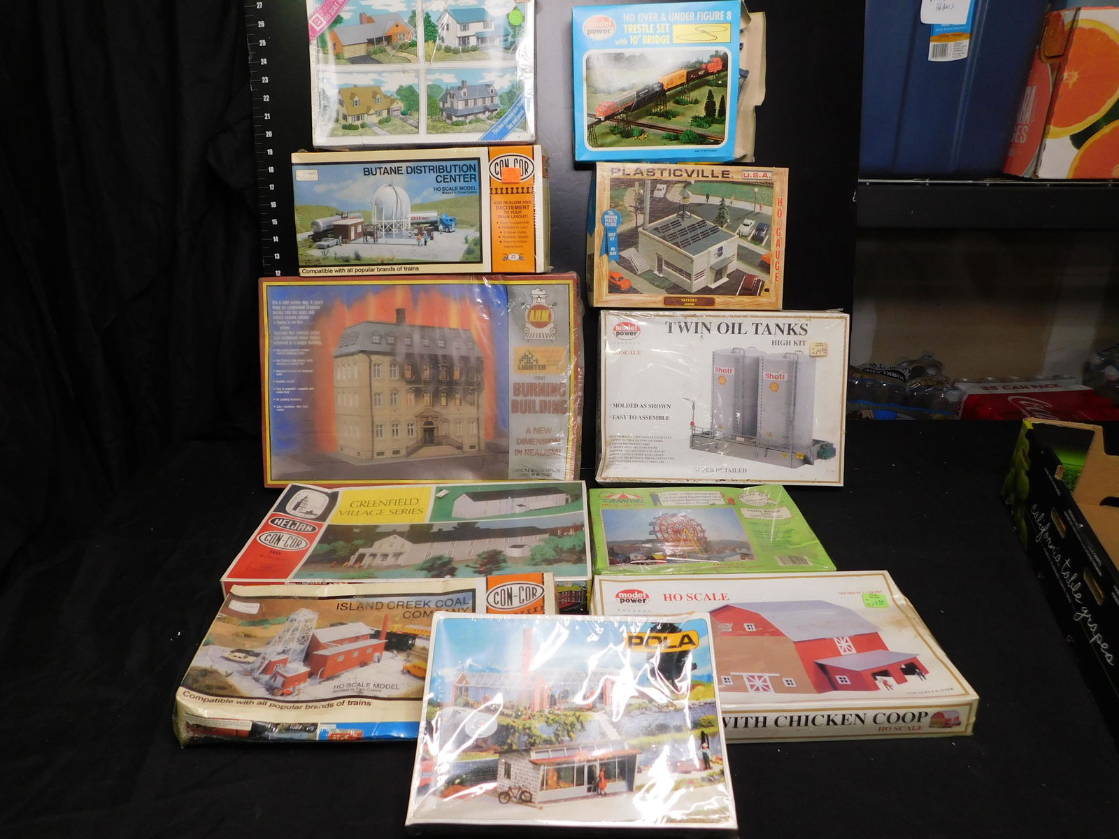 Lot of HO Scale Buildings: Lot of HO Scale Buildings including Barn, Ferris Wheel, Oil Tanks, Factory, Trestle Bridge, Homes, Burning Building and More. 9 Sealed. You are bidding at a live sale, please read the terms and condit