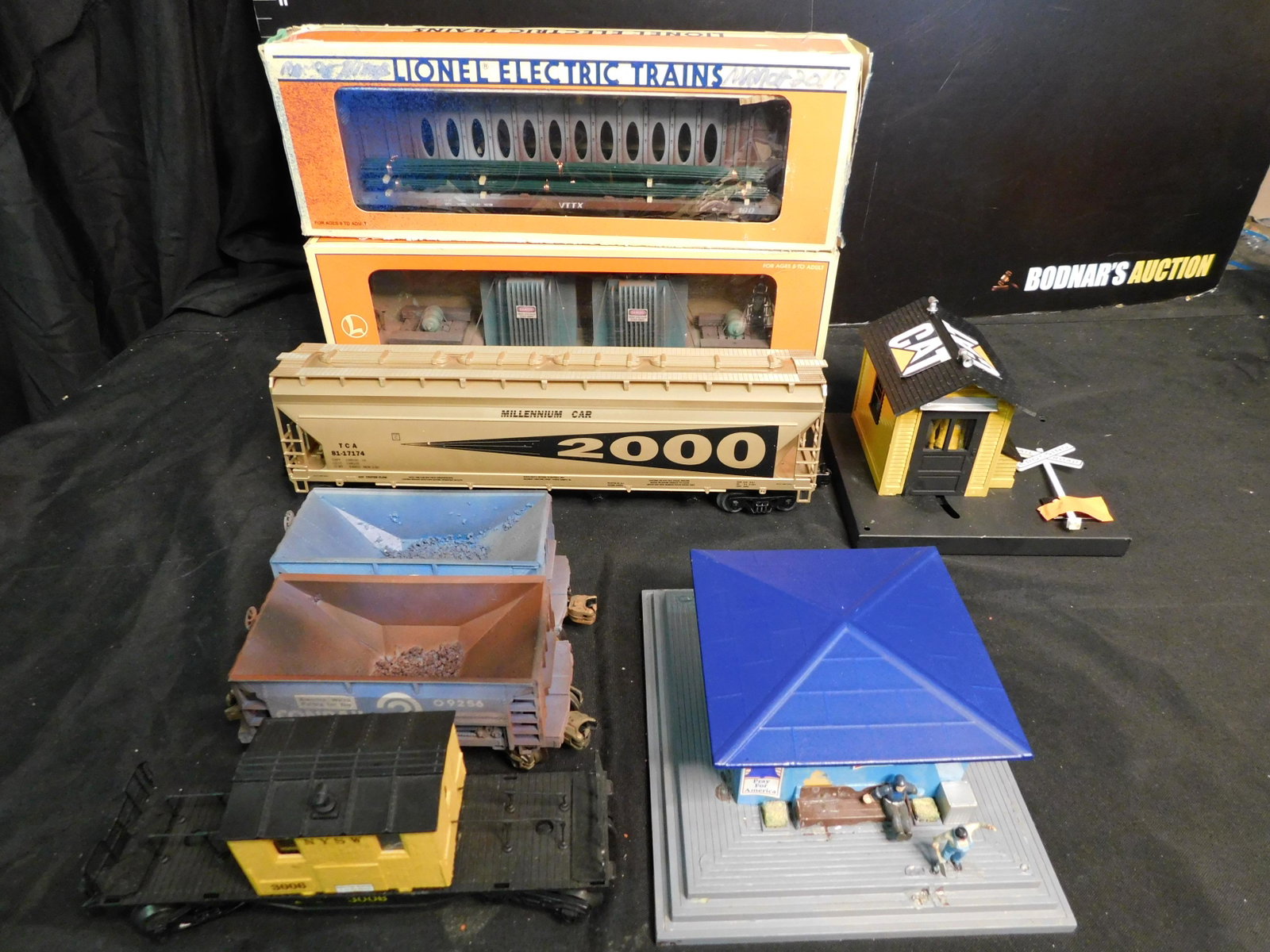 Group Lot of Train Cars and Accessories: Group Lot of Cars and Accessories including Lionel Flatcar with 2 High Voltage Transformers Weathers, Lionel I-Beam Flatcar with Load Weathered, Weaver TCA 2000 Millennium 4 Bay Hopper, 2 Customized C