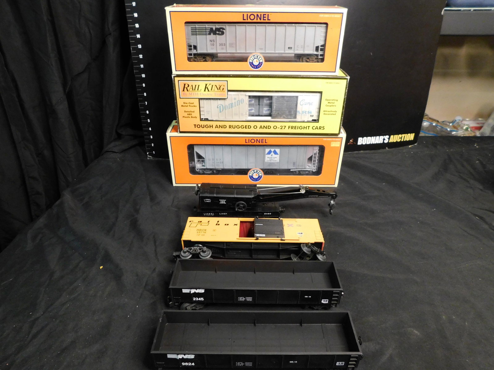 Group Lot of 7 Train Cars: Group Lot of 7 Train Cars including Lionel Rail Box Car 33716 - Ex. Cond, 2 x Customized Norfolk Southern Gondola, Lionel Post War 6460 Bucyrus Erie Crane Car - Metal Trucks, MTH Rail King Domino Box 